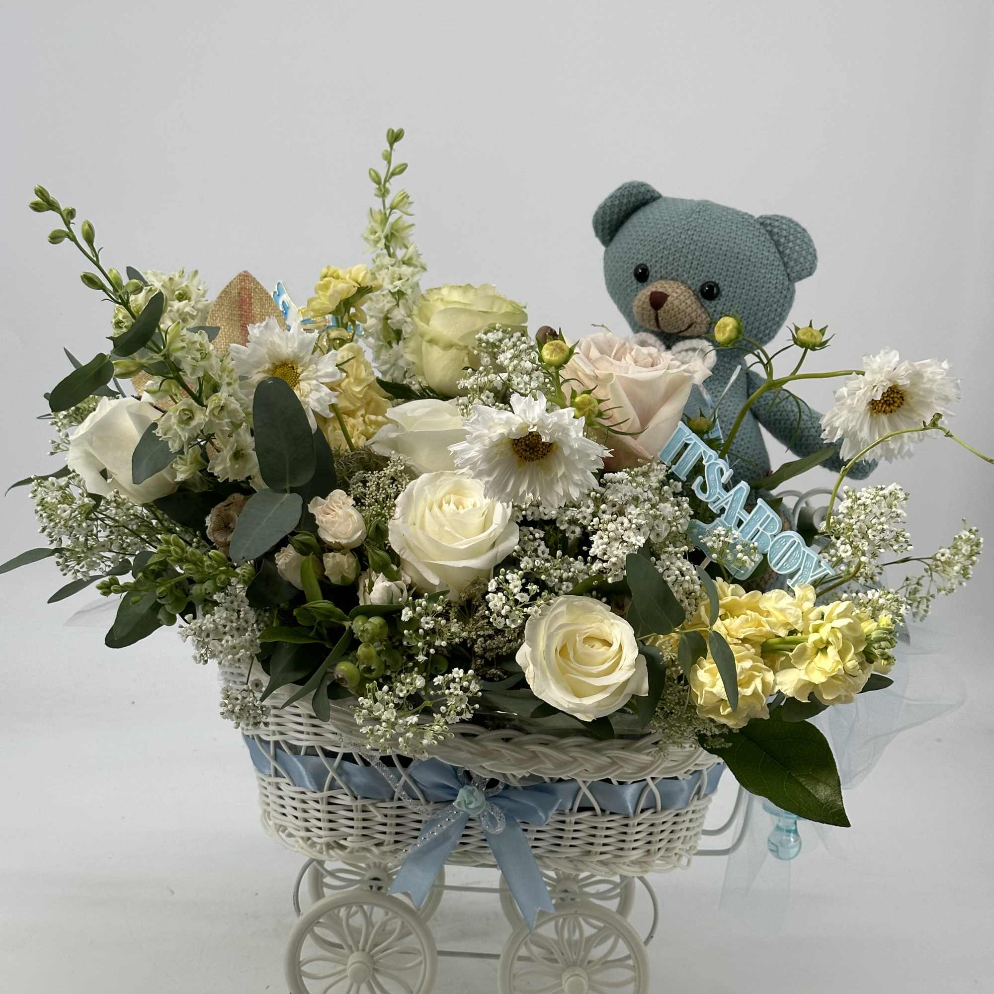 An elegant baby -boy arrangement of soft ivory and cream blooms accented, photo 2 of 3