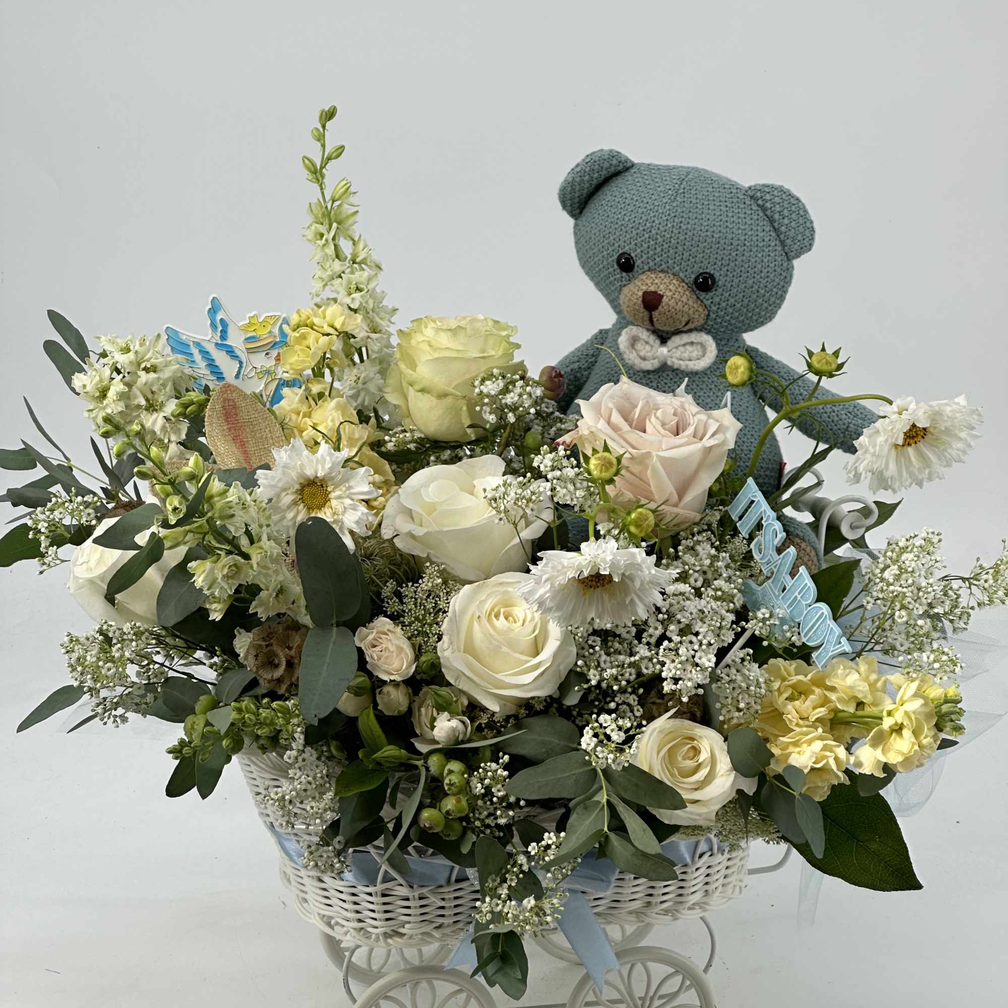 An elegant baby -boy arrangement of soft ivory and cream blooms accented, photo 3 of 3