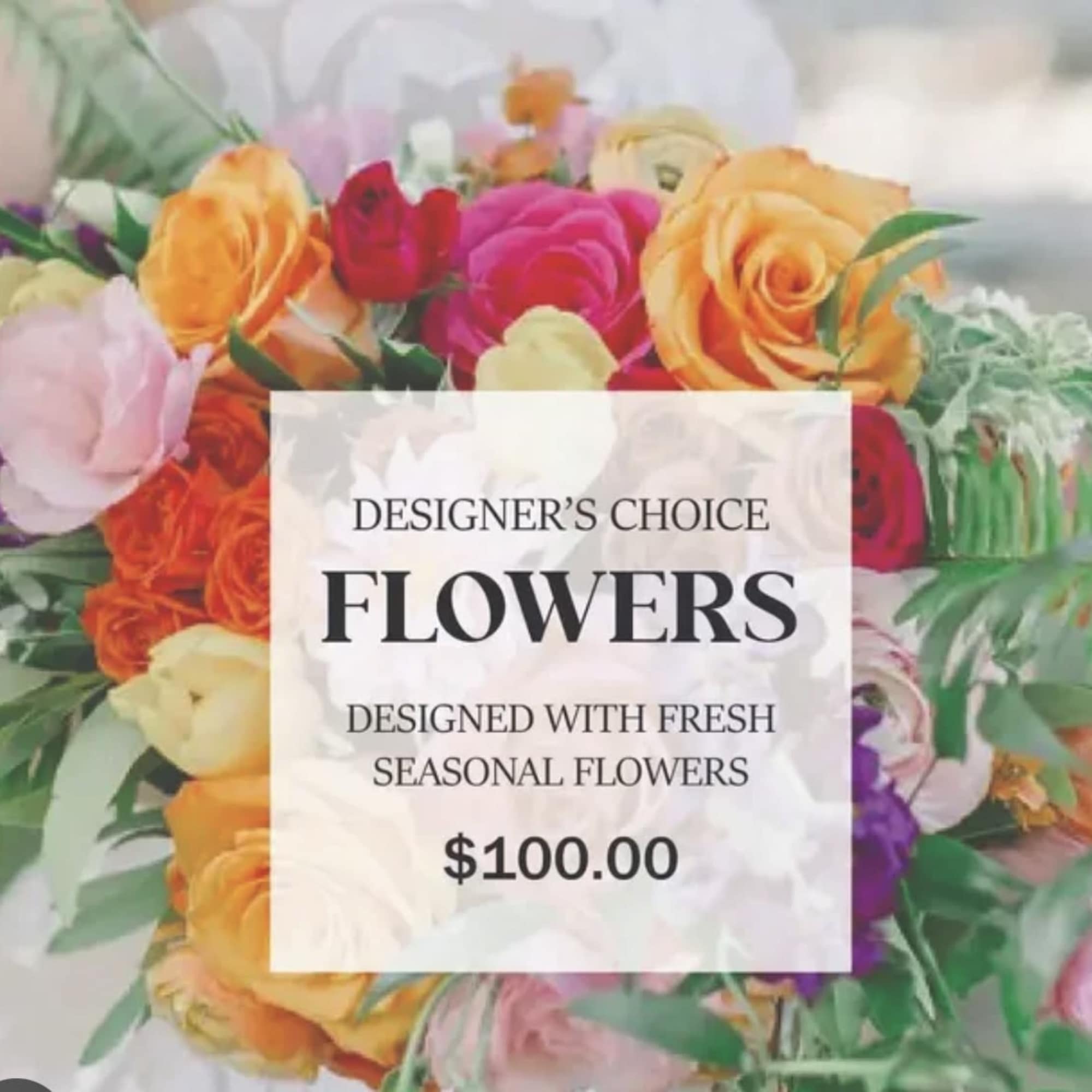 Mixed bouquet of colorful roses with greenery