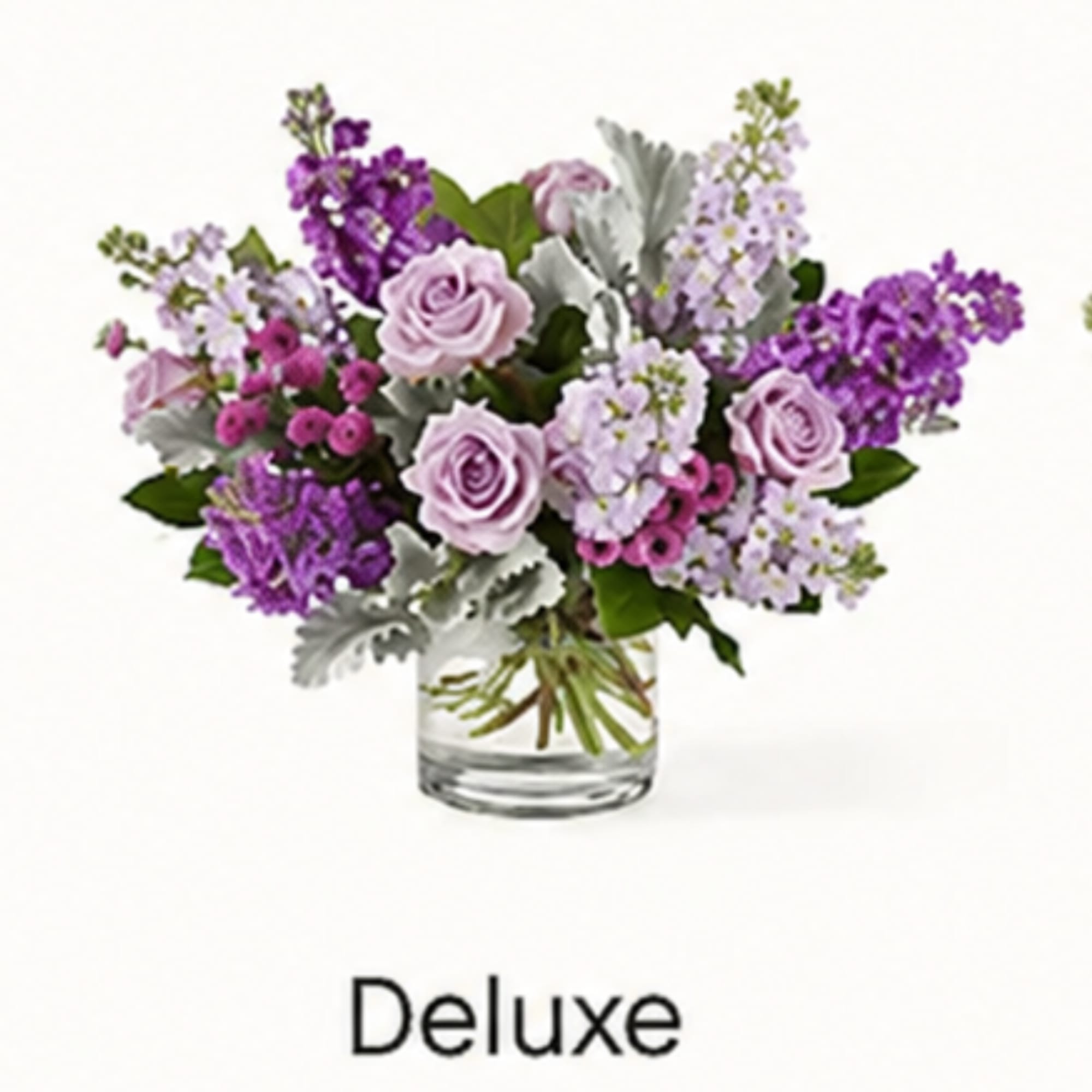 Lavender and purple bouquet in a clear glass vase
