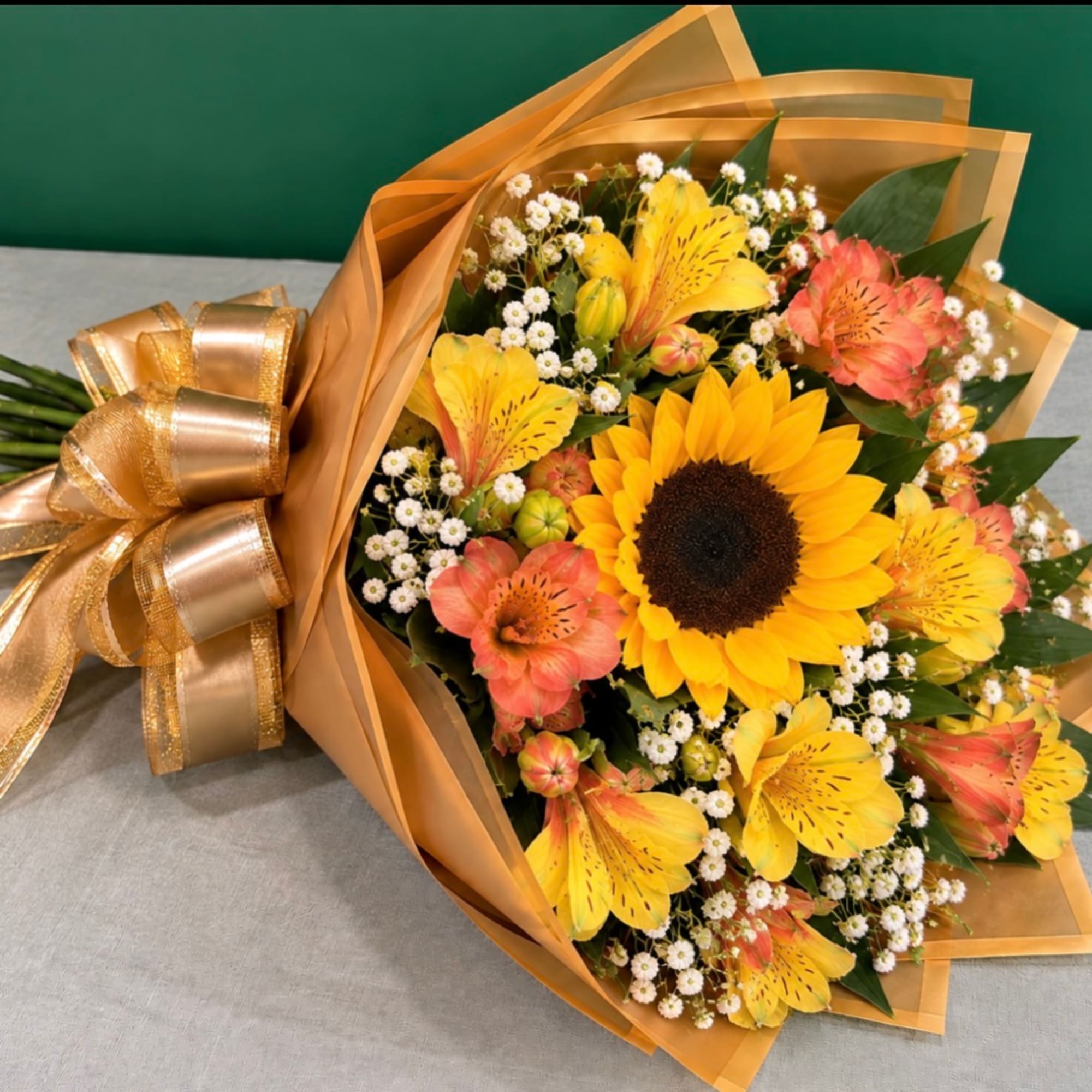 Bouquet of sunflowers and orange alstroemeria wrapped in gold paper, photo 4 of 4
