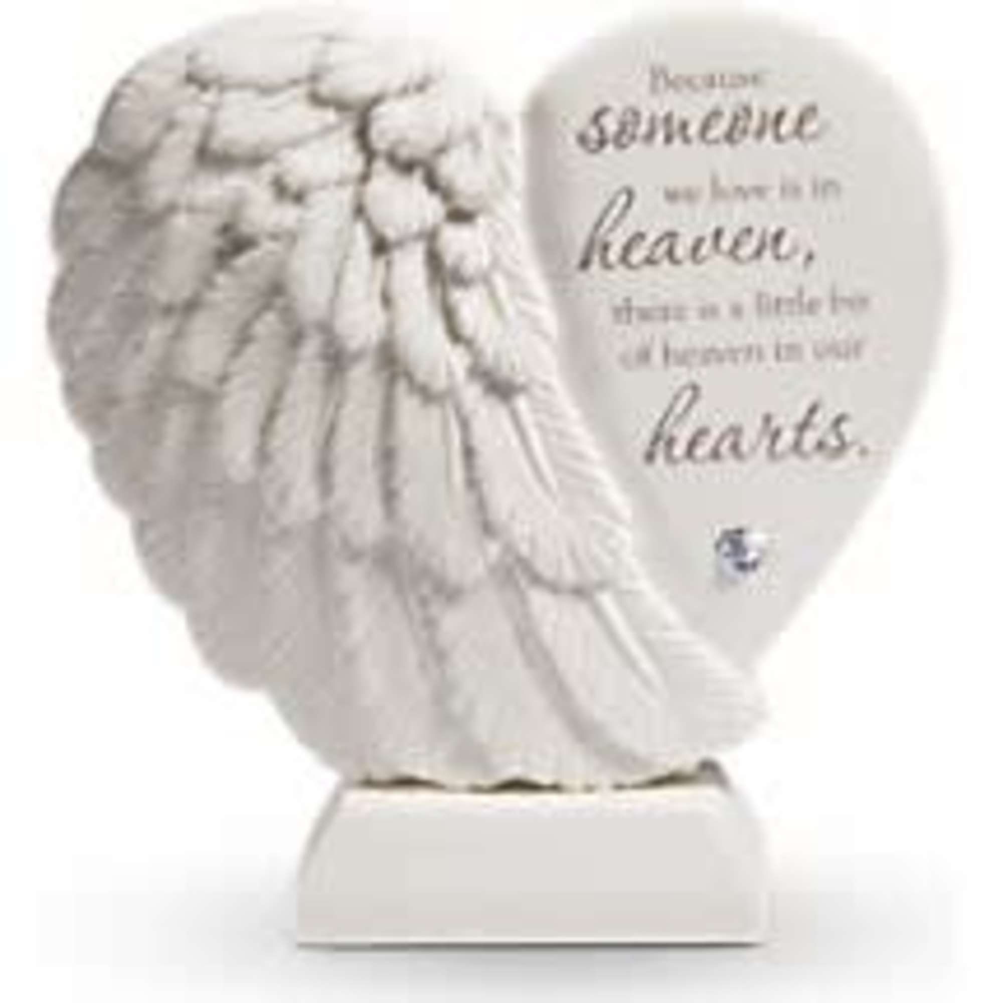 White angel wing and heart-shaped memorial plaque with script text on a rectangular base.