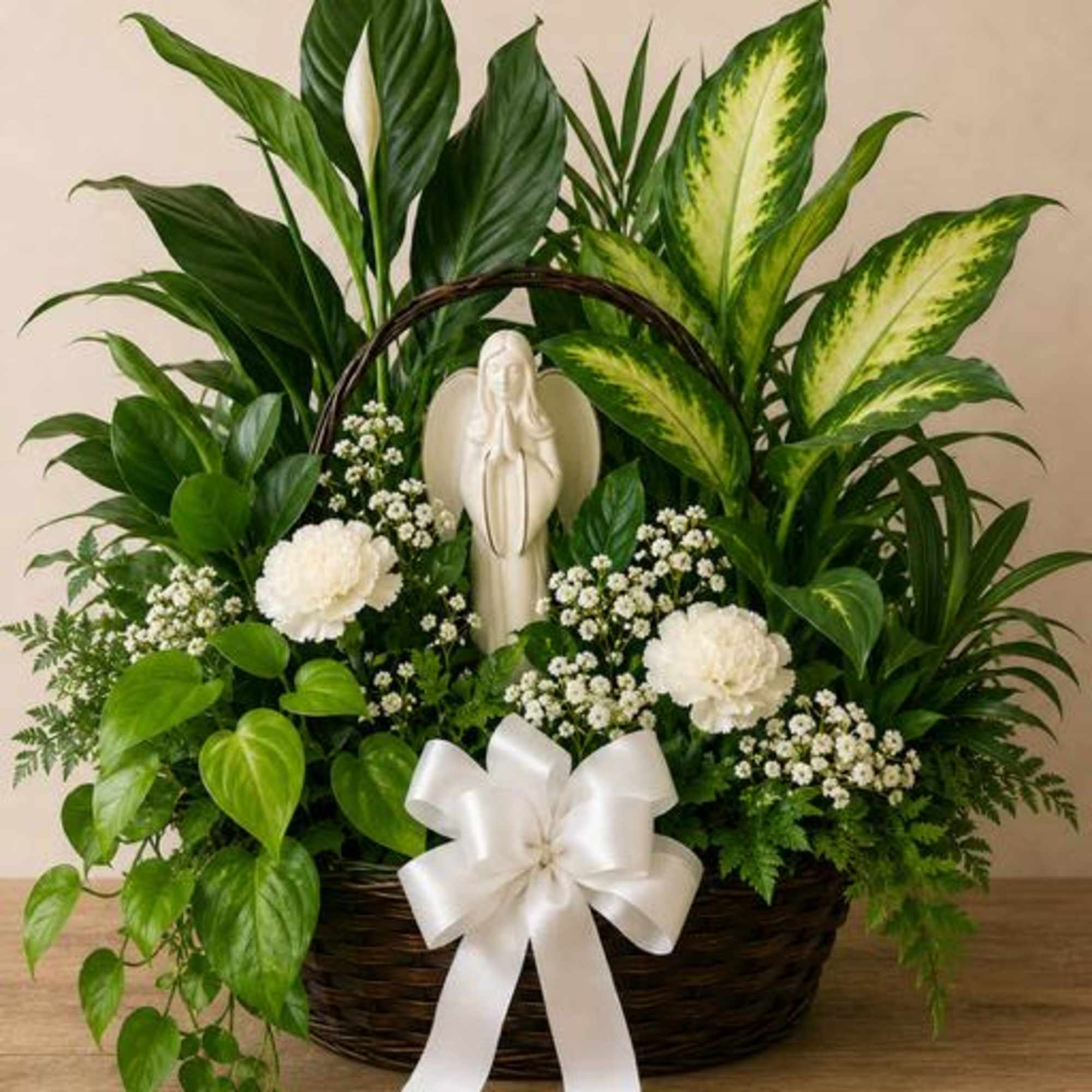 Garden of Angels combines a beautiful angel keepsake with lush green plants