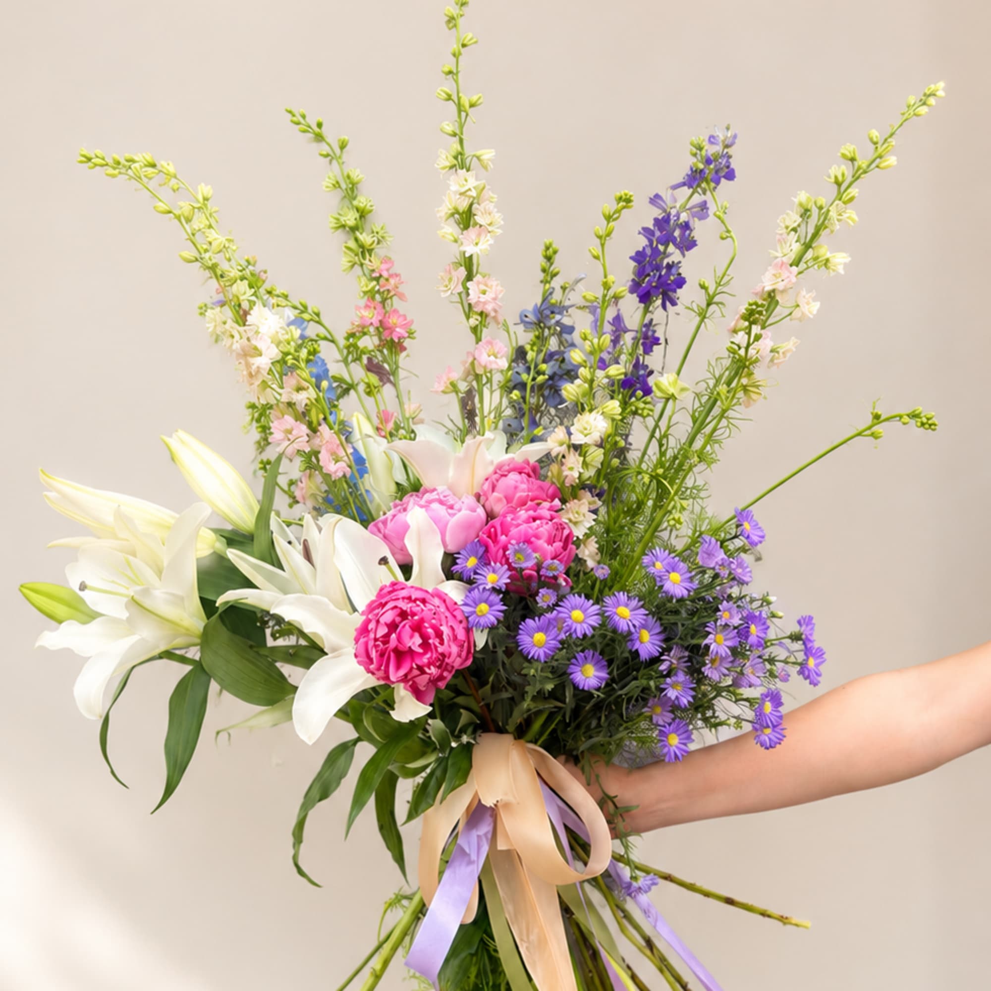 A lush hand-tied bouquet that reads like a sunlit meadow-perfect as a, photo 2 of 2
