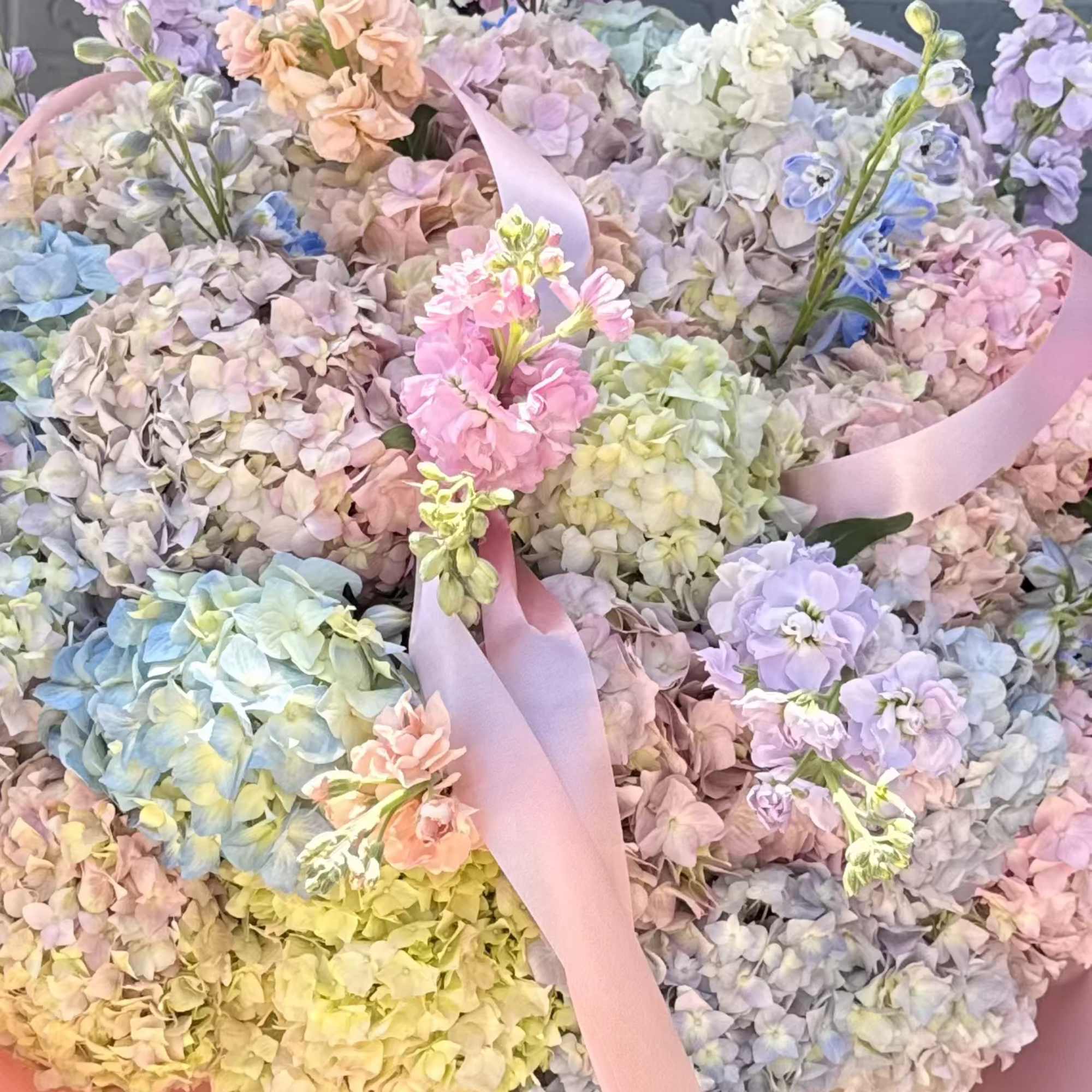 An oversized, hand-held pastel bouquet that reads like a daydream-perfect as a, photo 2 of 2