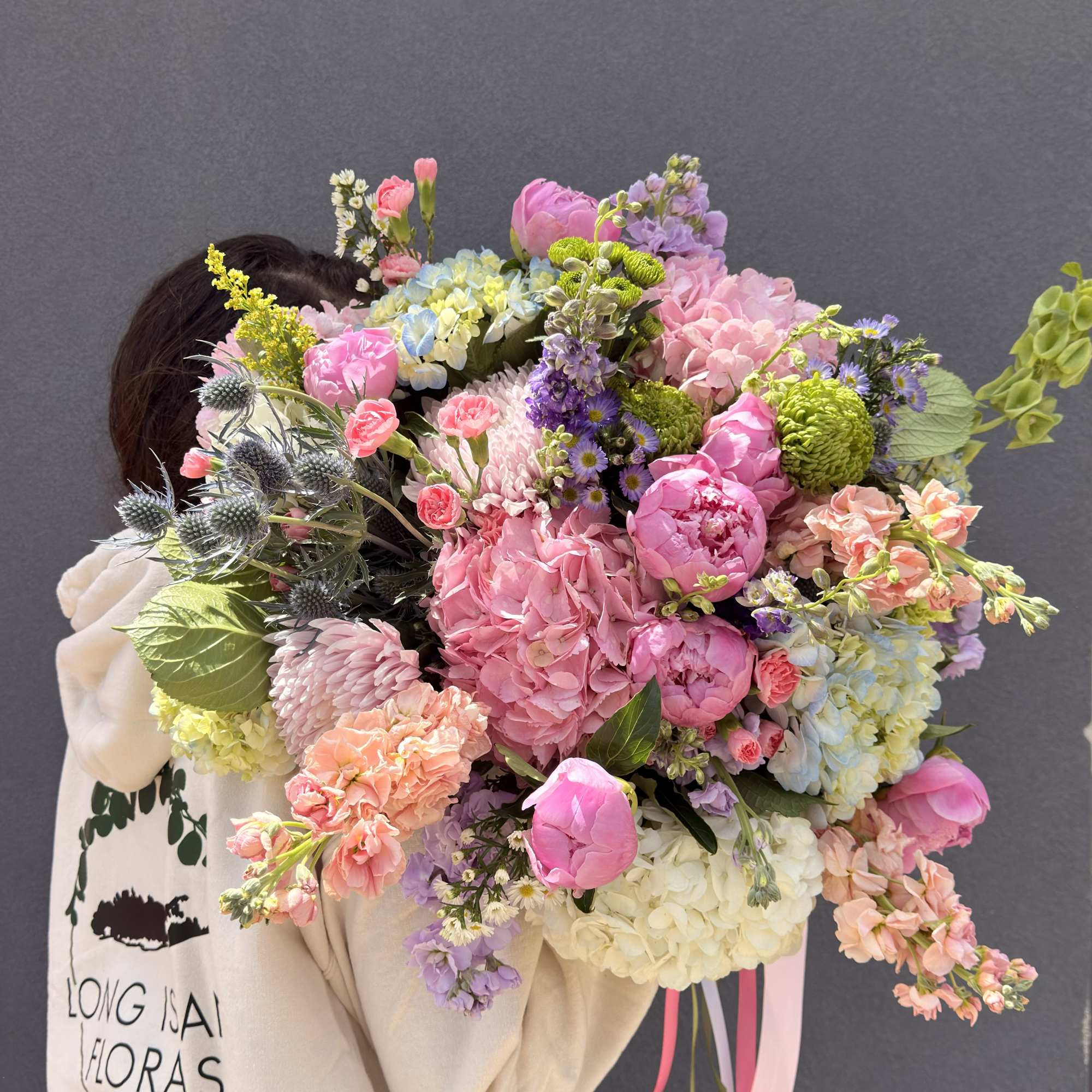 A lush, hand-tied garden bouquet that feels like a spring meadow gathered