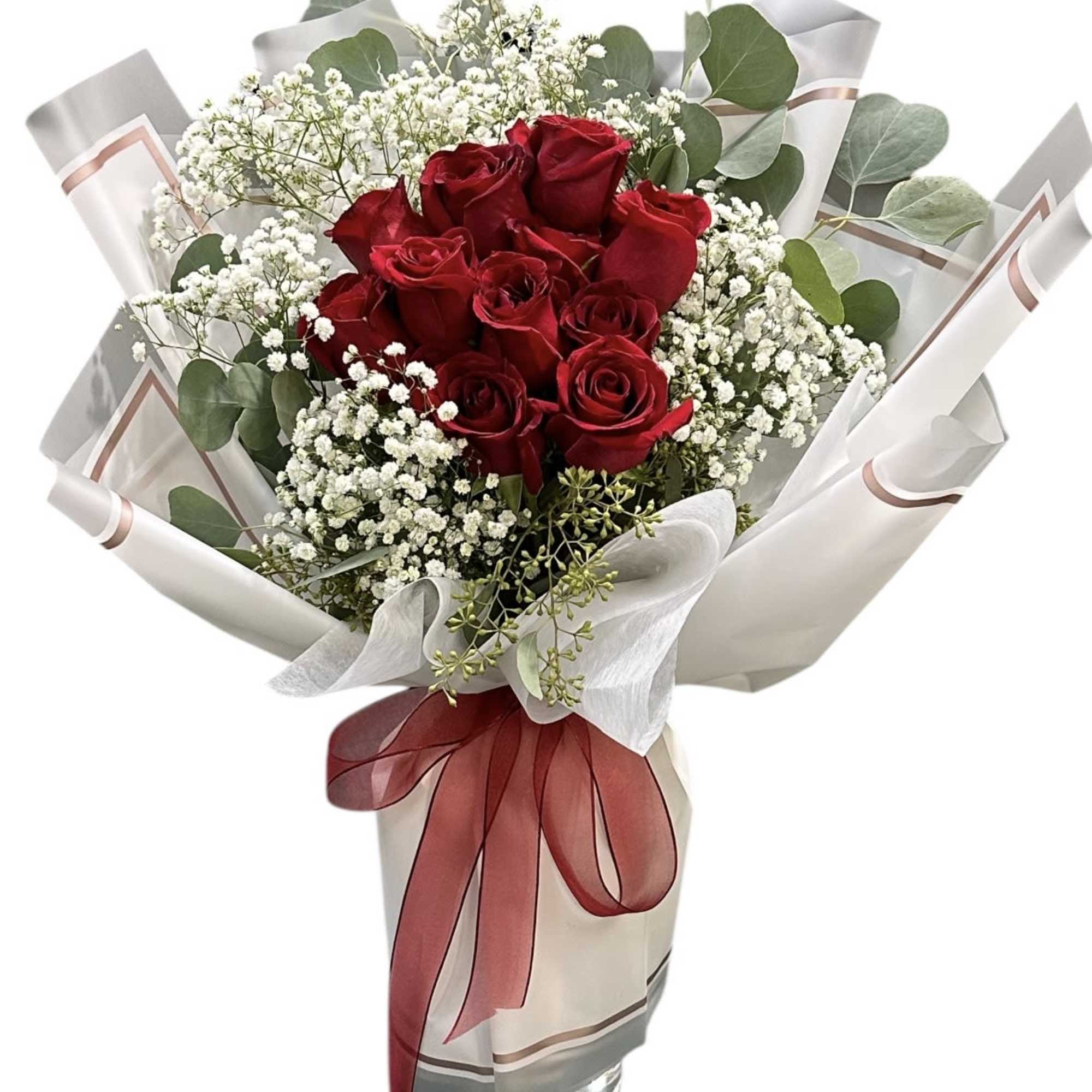 Bouquet of red roses with white baby's breath and eucalyptus in wrapping