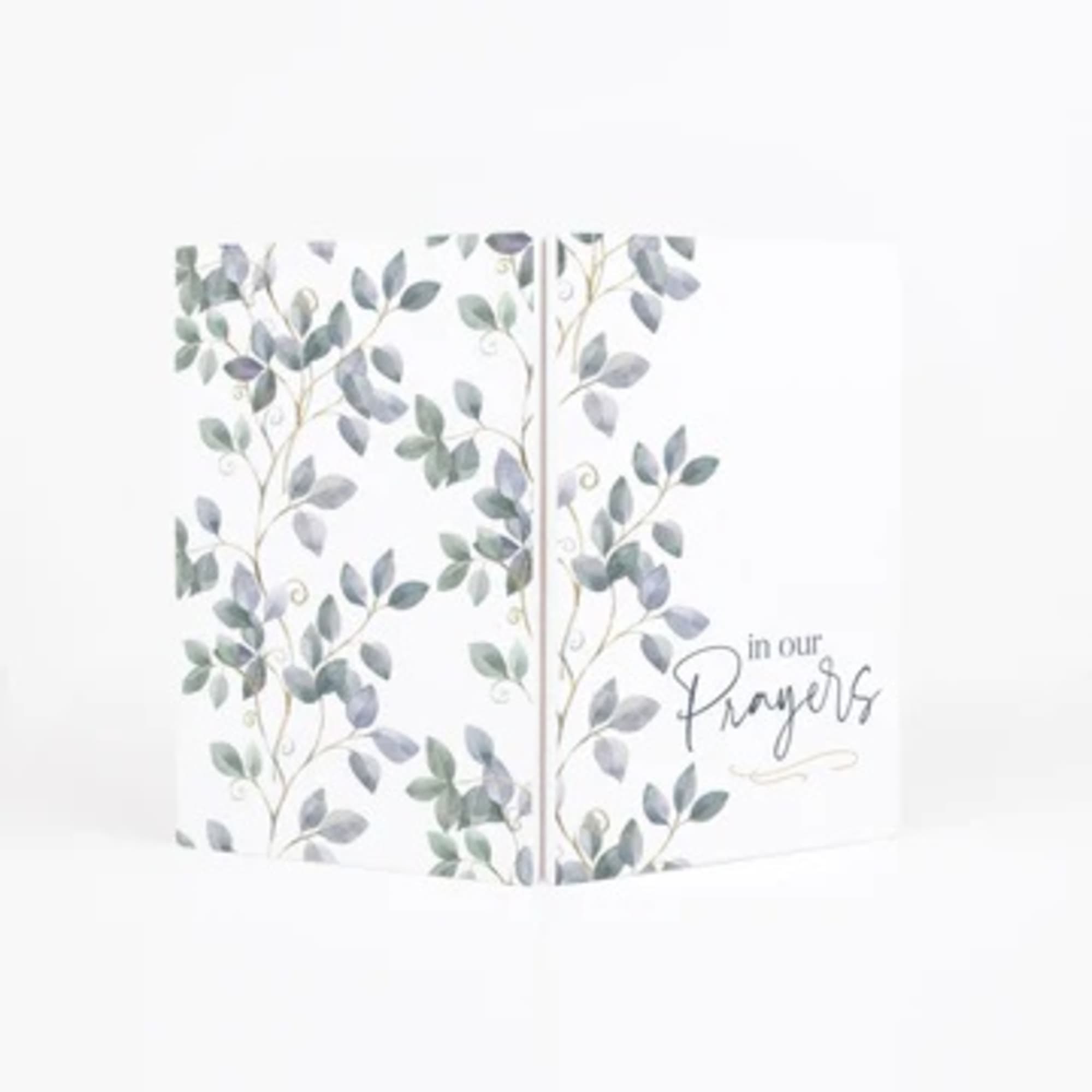 Greeting card with leafy watercolor branches and the words "in our prayers"