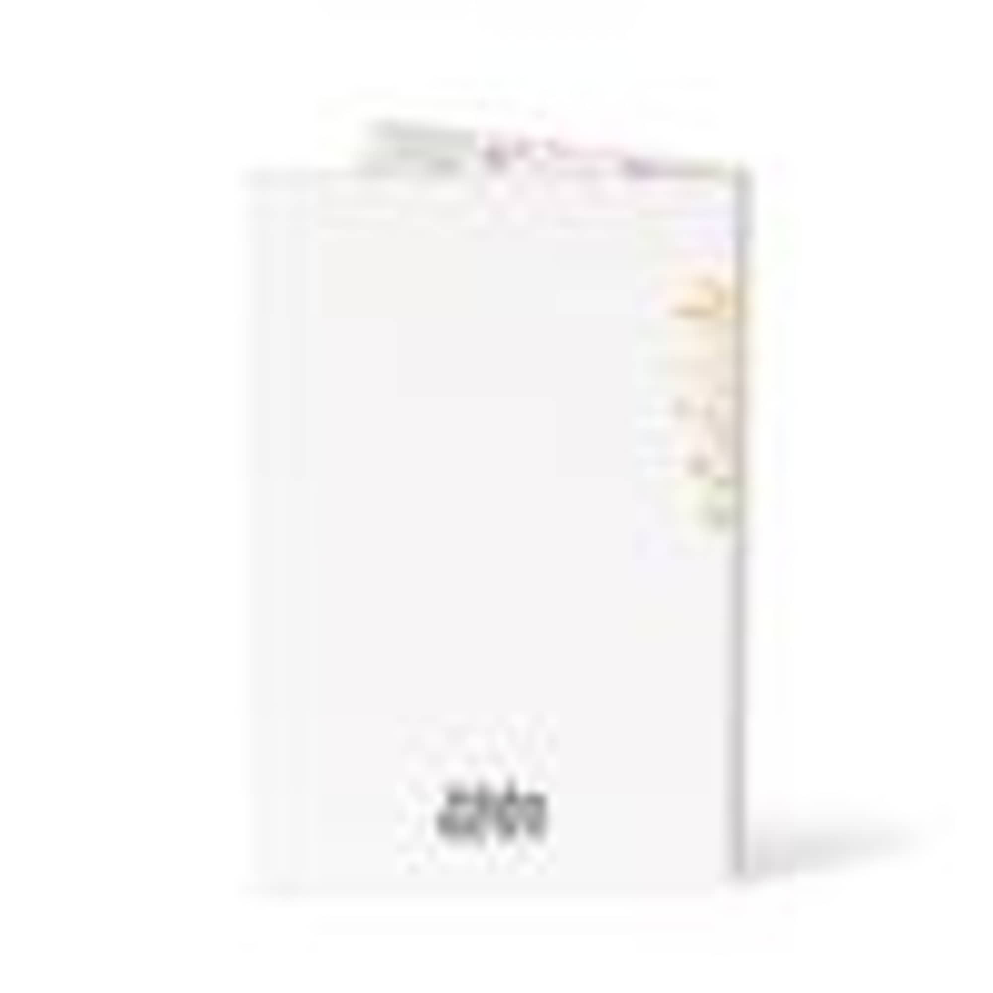 White gift bag with a small floral accent near the top