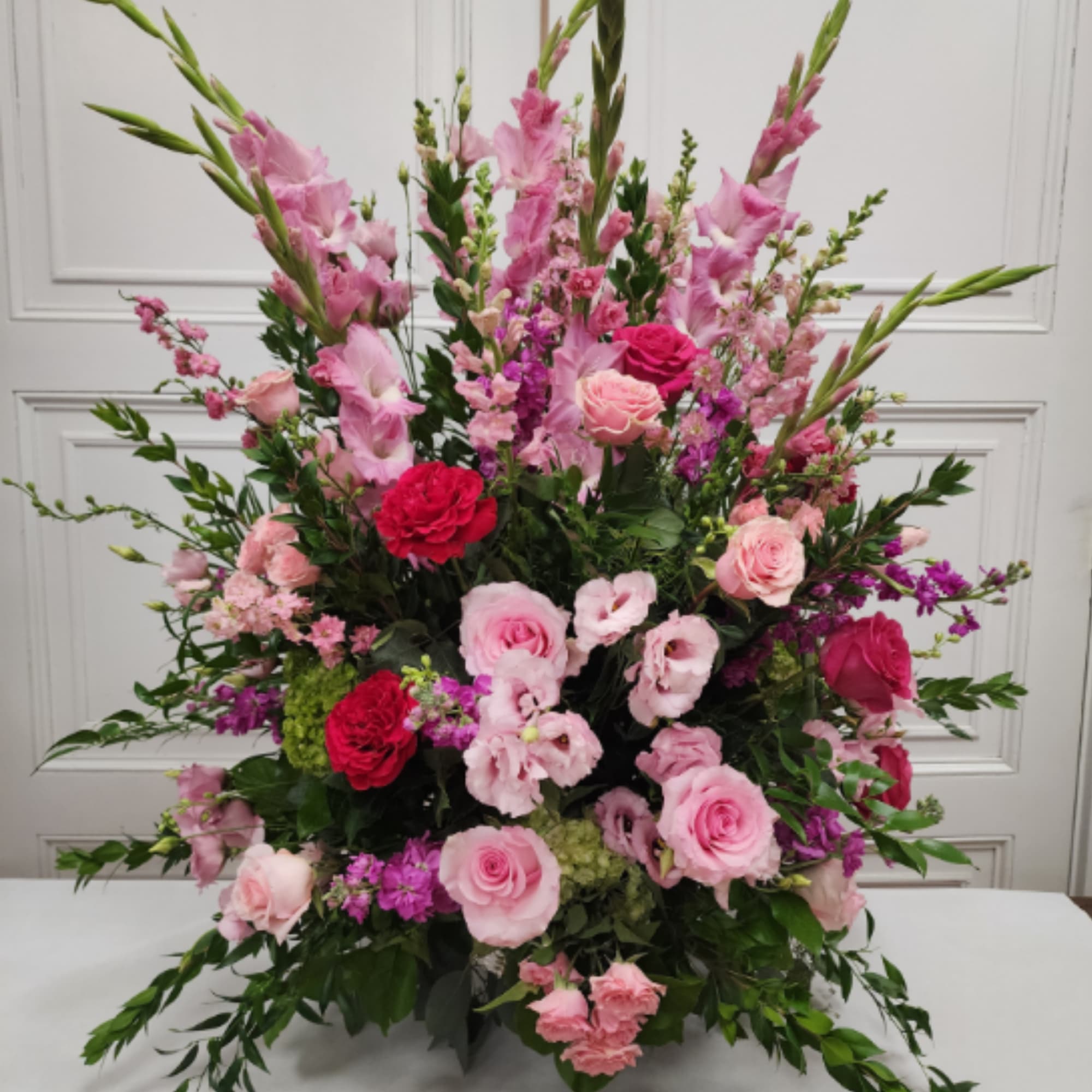 A heartfelt expression of love, comfort, and remembrance, the Gentle Embrace Sympathy