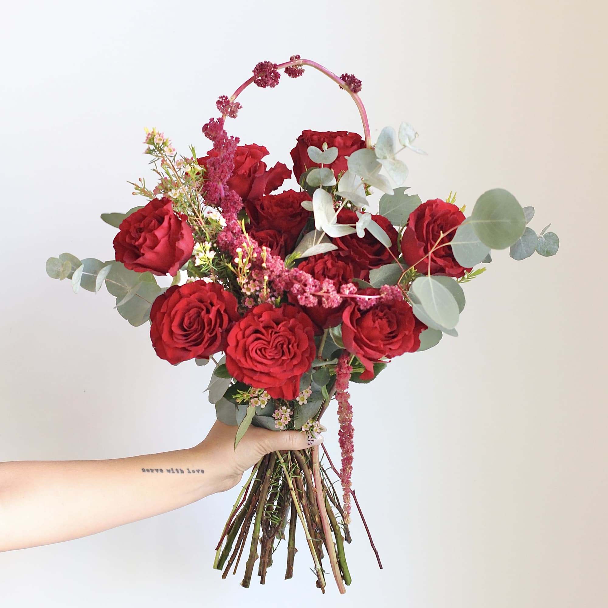 A classic expression of love, this one dozen rose bouquet features lush, photo 3 of 3