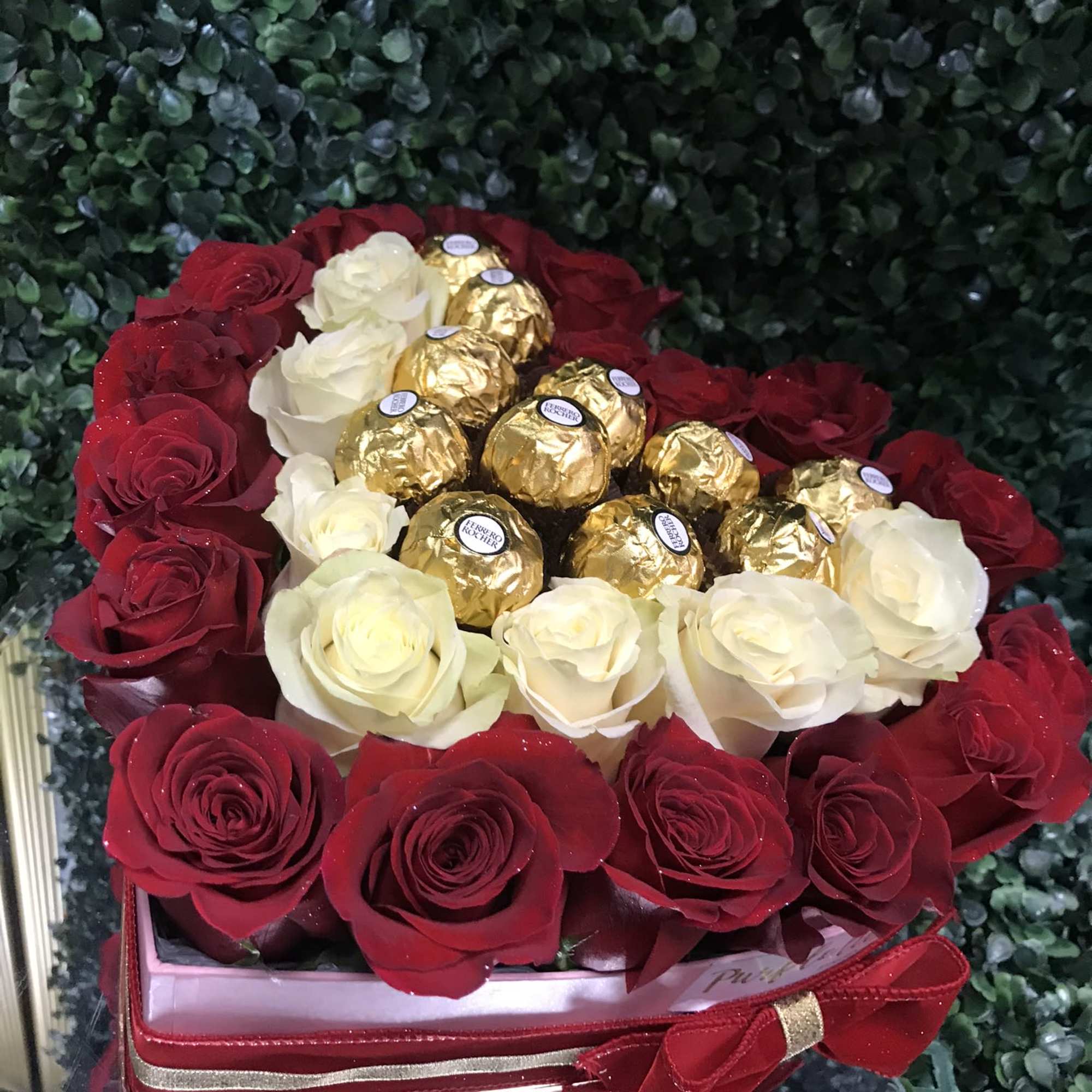 Heart-shaped rose arrangement with Ferrero Rocher chocolates