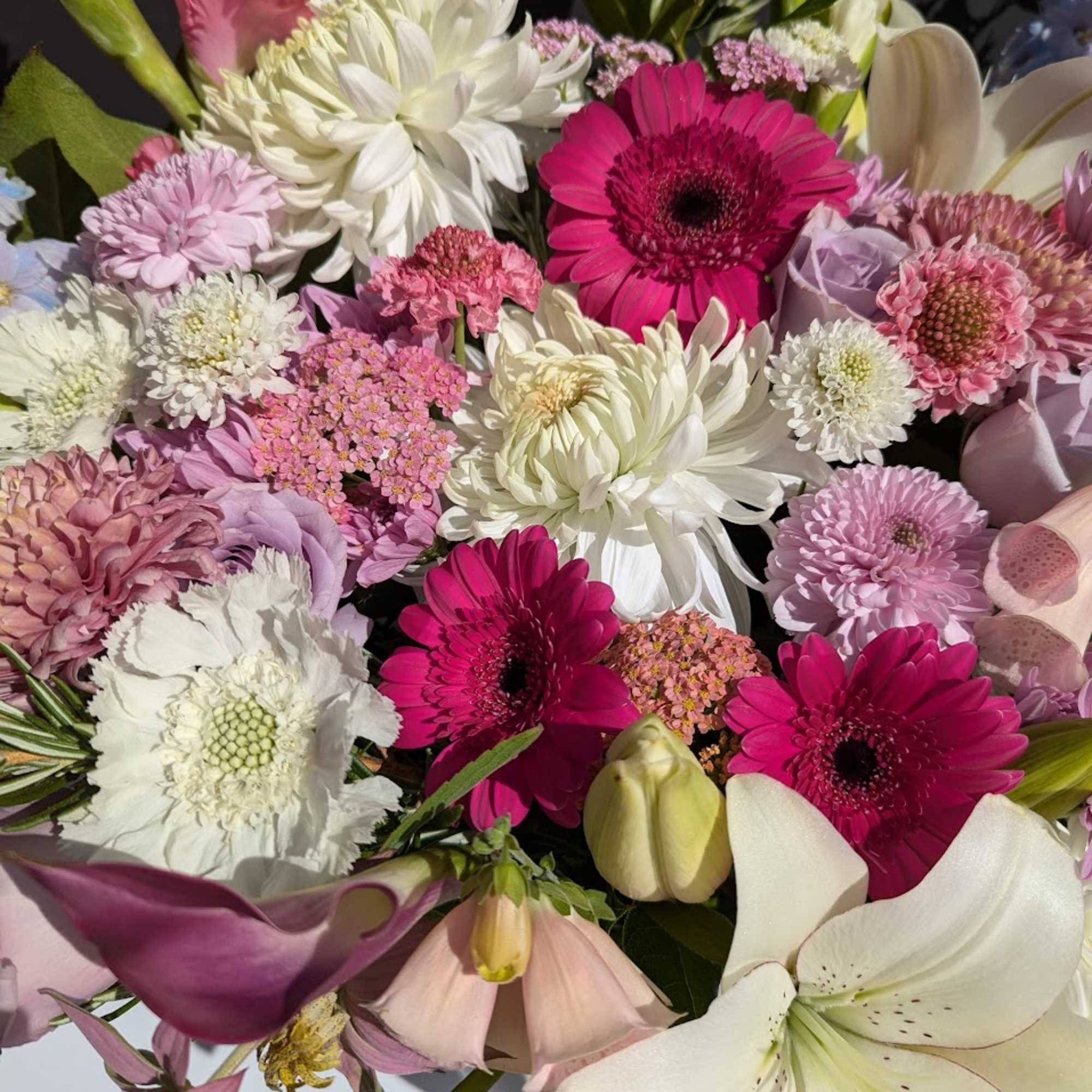 Mixed bouquet with pink, white, and lavender flowers