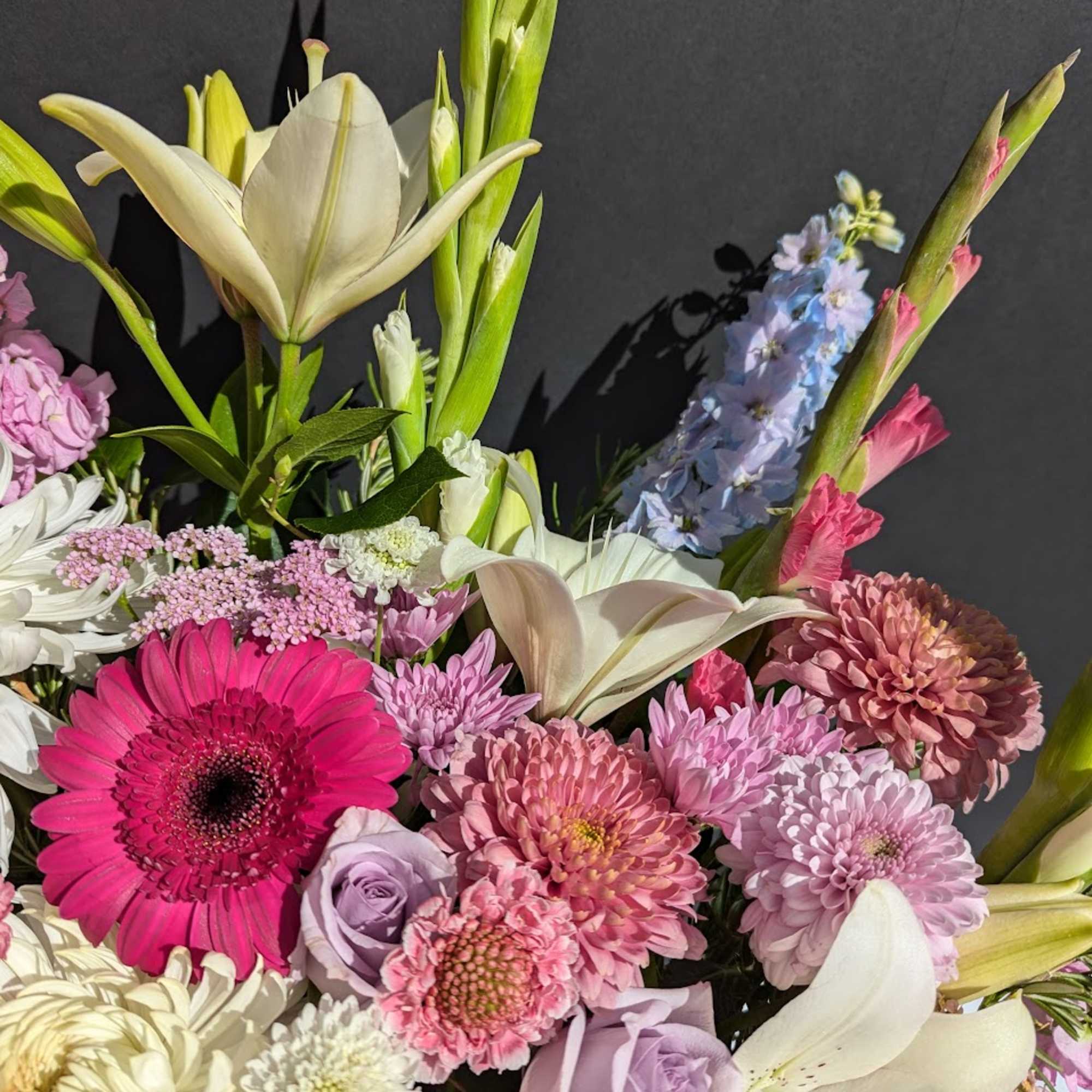 Mixed bouquet with pink, lavender, and white flowers