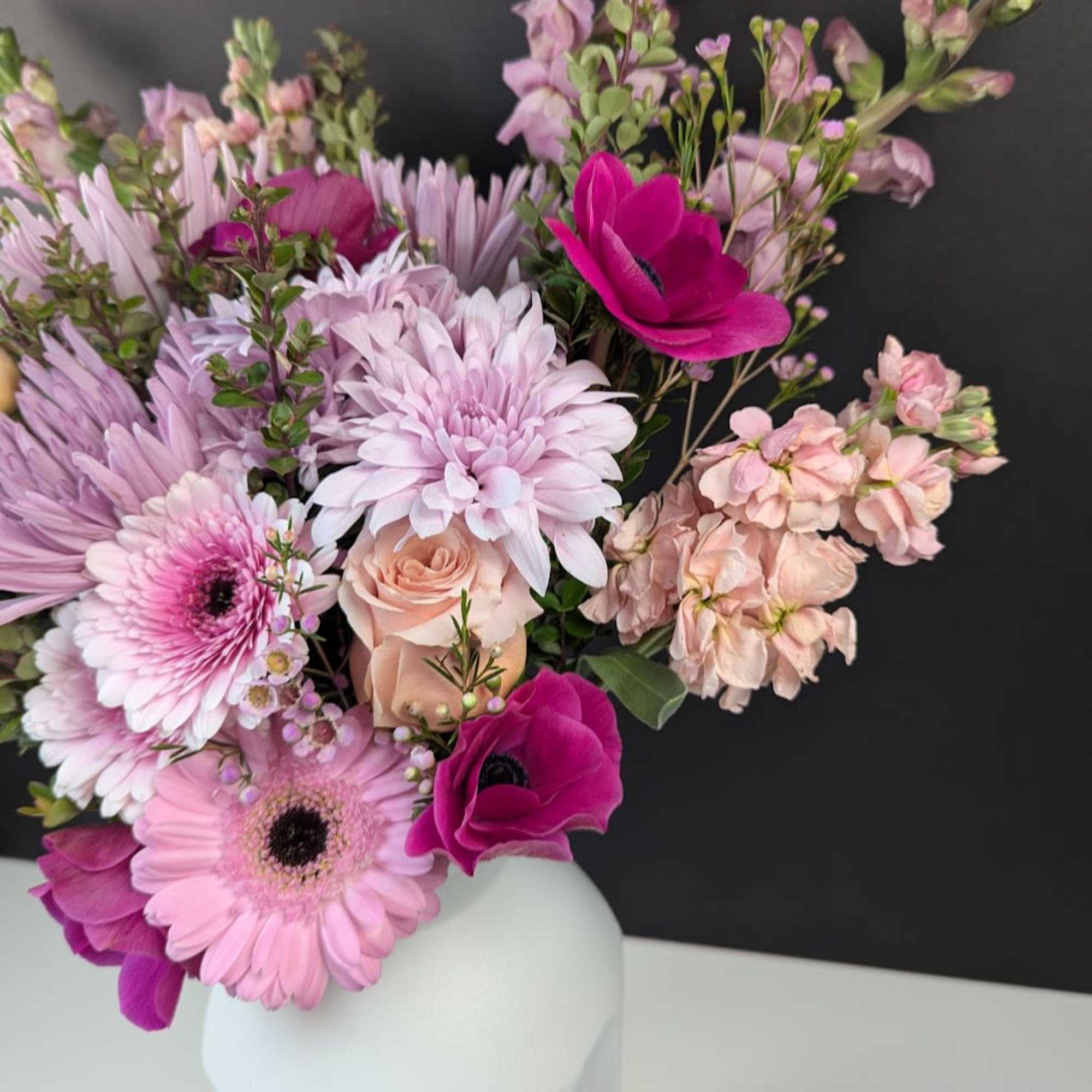 Pink and lavender bouquet in a white vase, photo 3 of 4