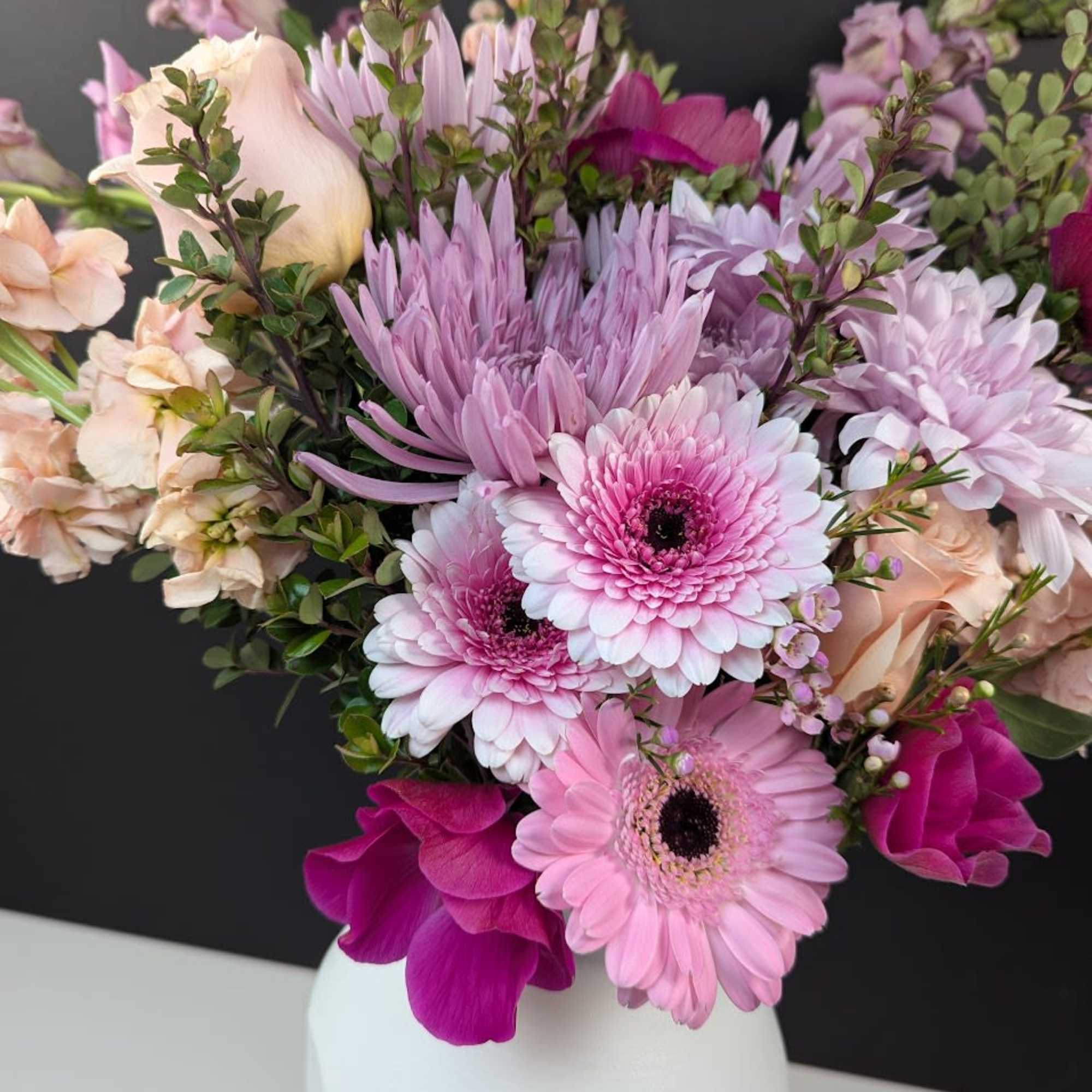 Pink and lavender bouquet in a white vase, photo 4 of 4