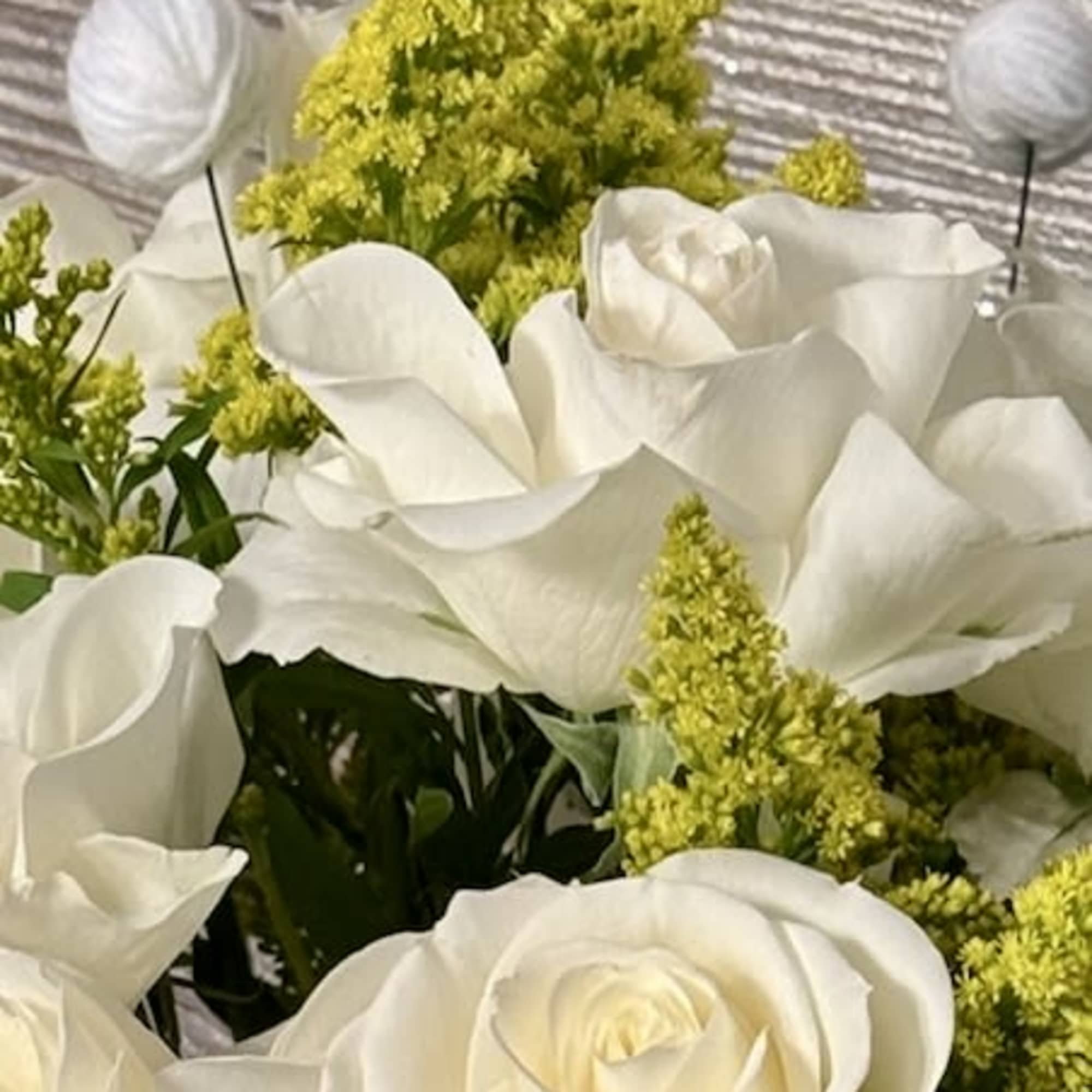 White roses and calla lilies with yellow filler flowers, photo 2 of 4
