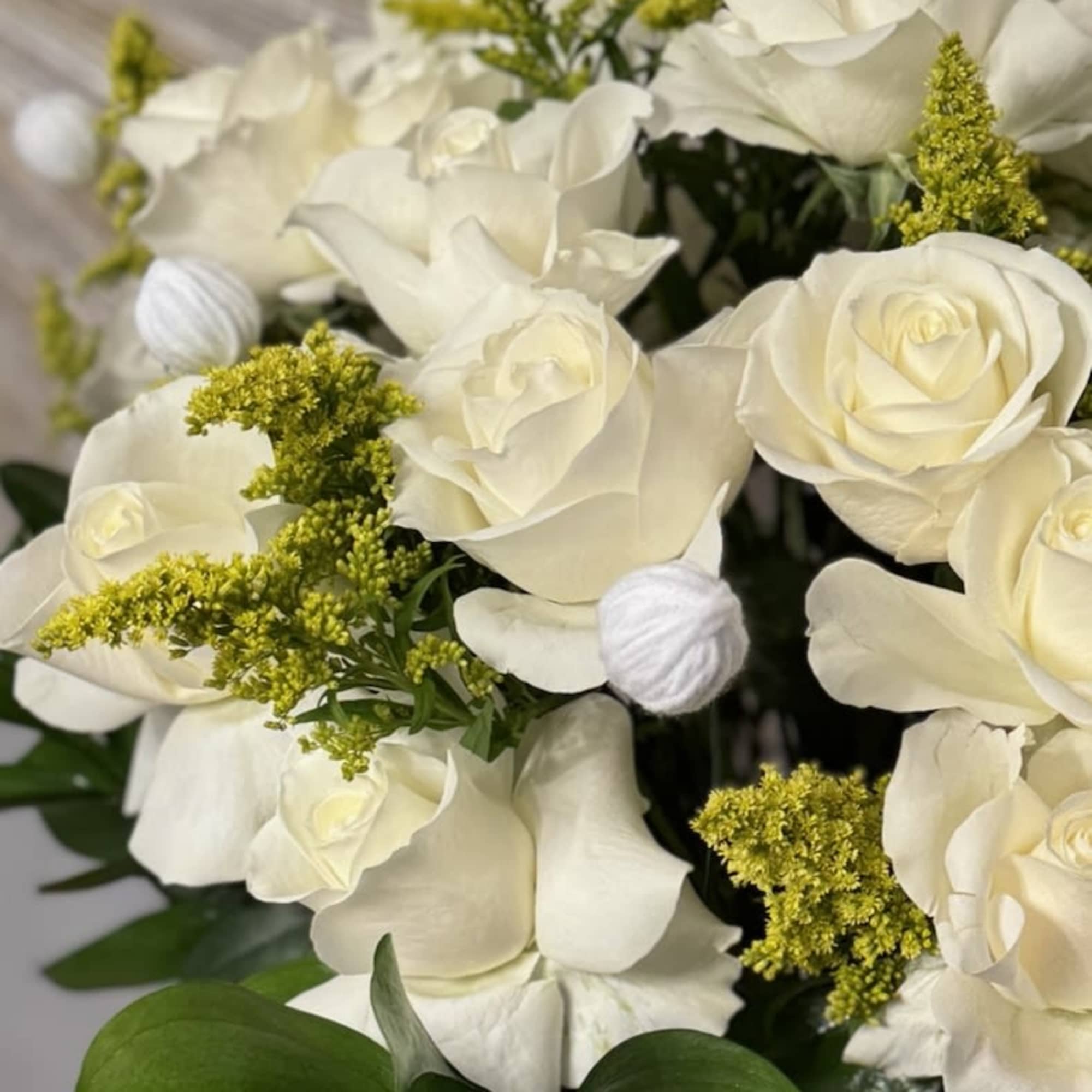 White roses and calla lilies with yellow filler flowers, photo 3 of 4