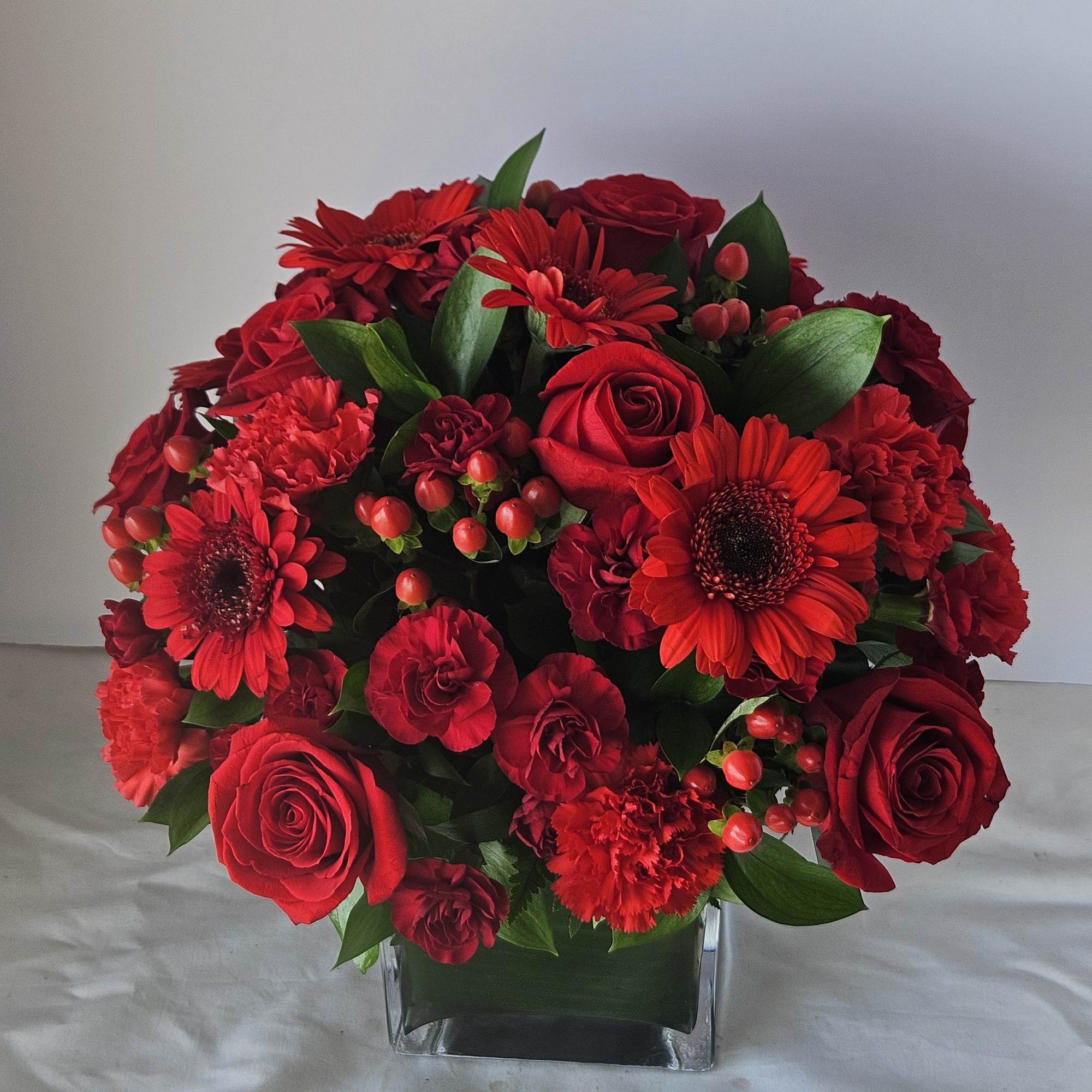 The symbol of courage and strength, an all-red bouquet conveys your emotions