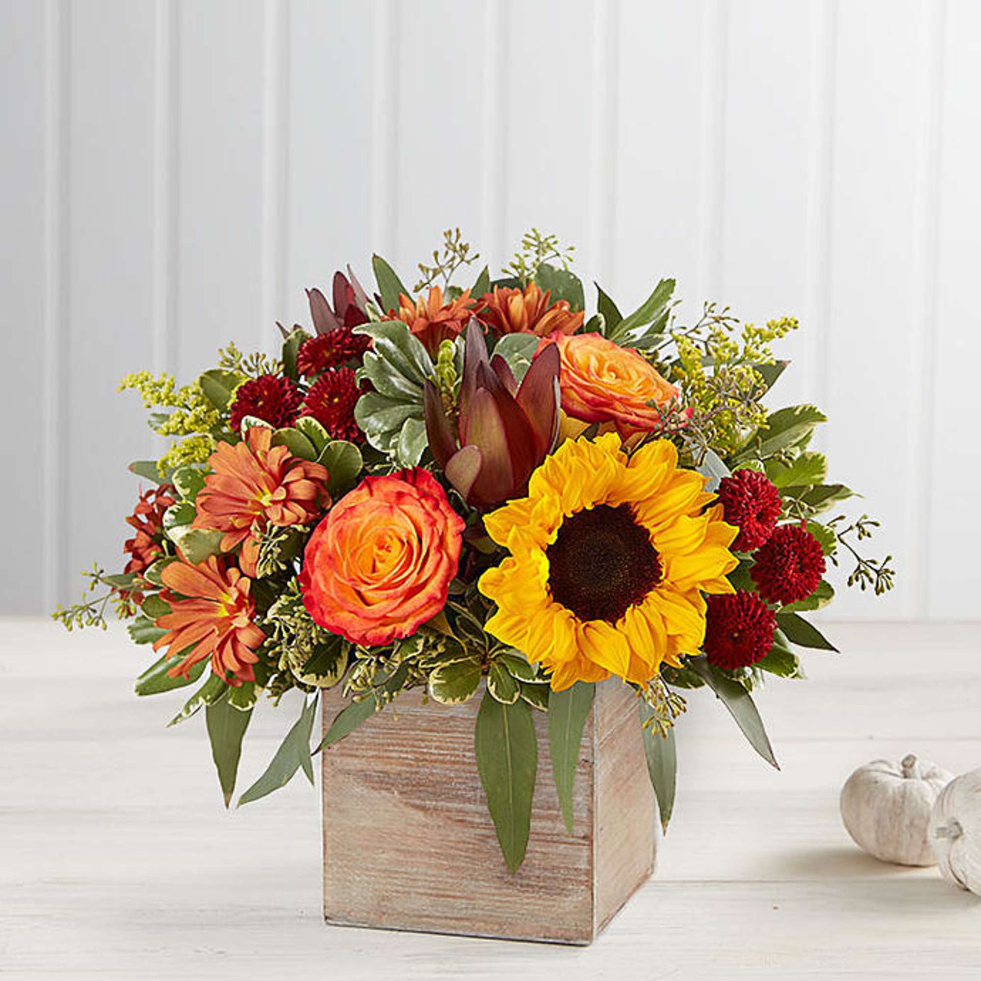 Natural gathering of blooms in vibrant shades of red, orange and yellow, photo 2 of 2