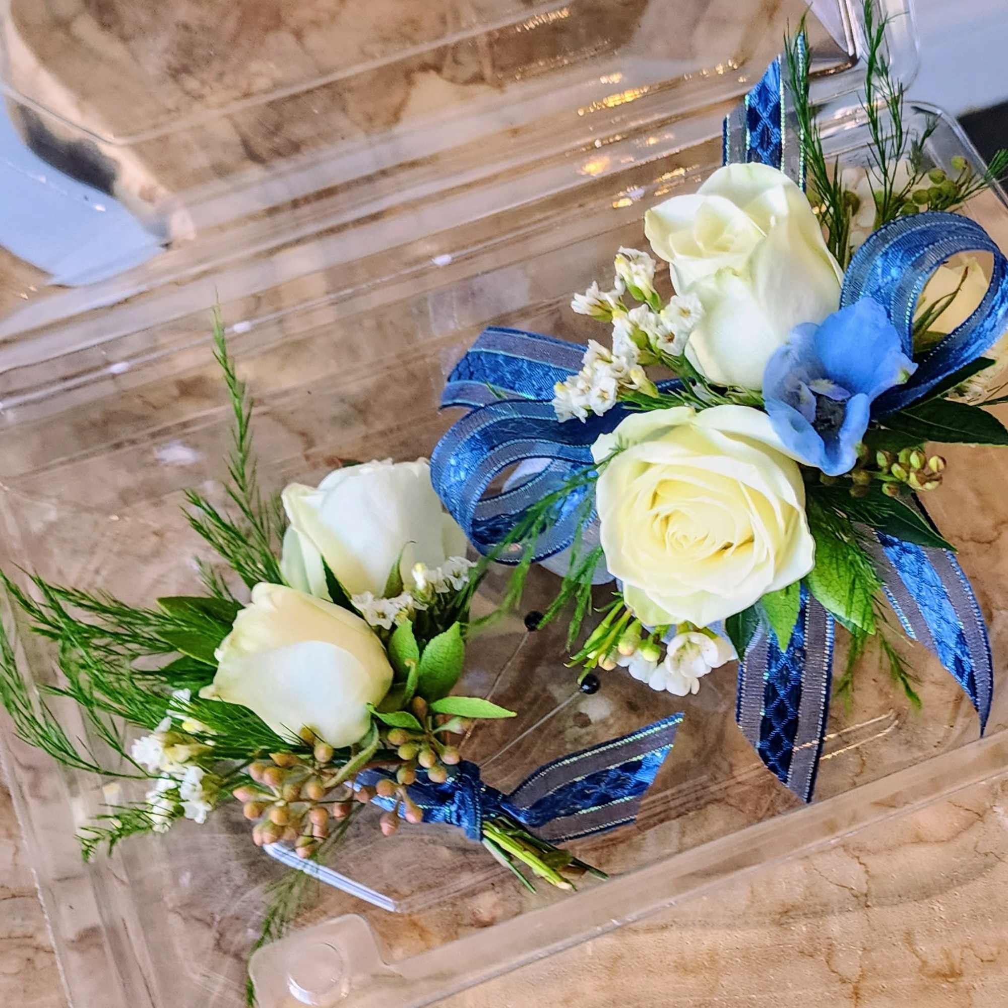 Make prom or homecoming night unforgettable with our elegant Corsage &amp; Boutonniere