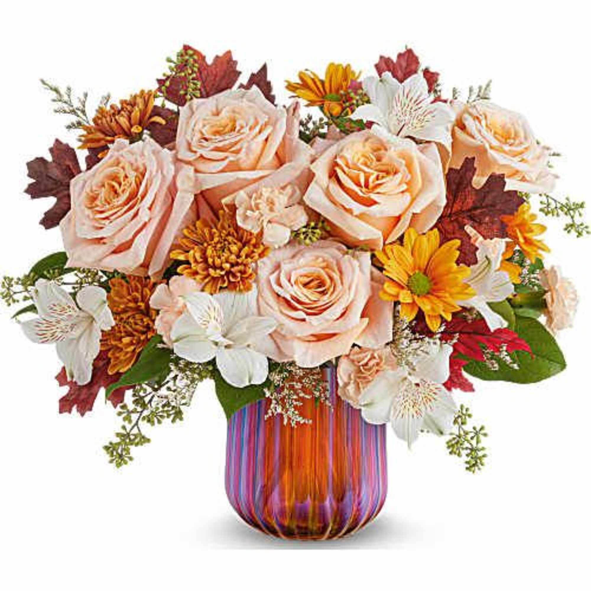 Teleflora's Fall Luxe Bouquet blends soft peach blooms with golden autumn accents
