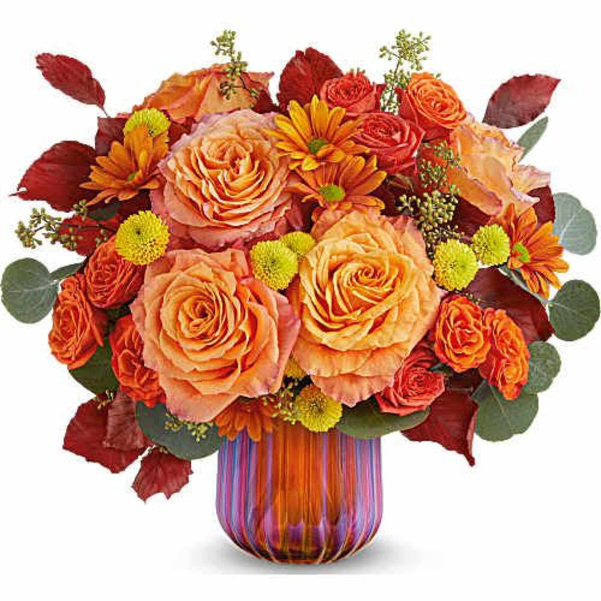 Teleflora's Sunset Shine Bouquet glows with radiant orange blooms and golden accents