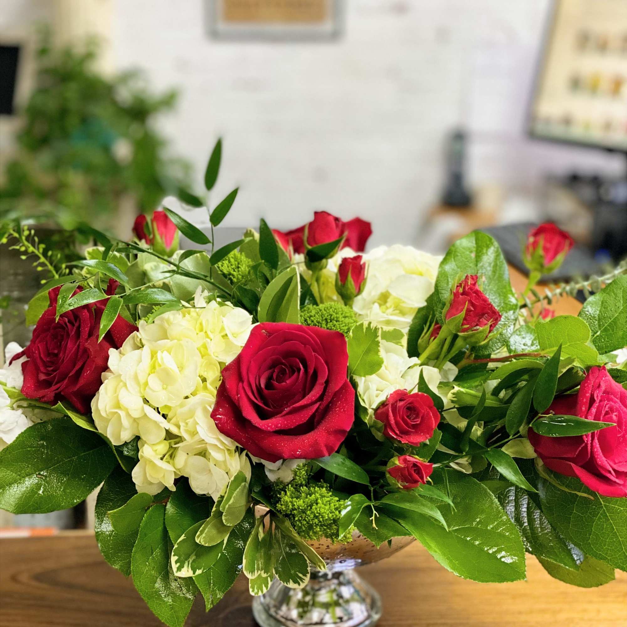 Red Roses with white florals in an elegant metallic pedestal vase, photo 2 of 3