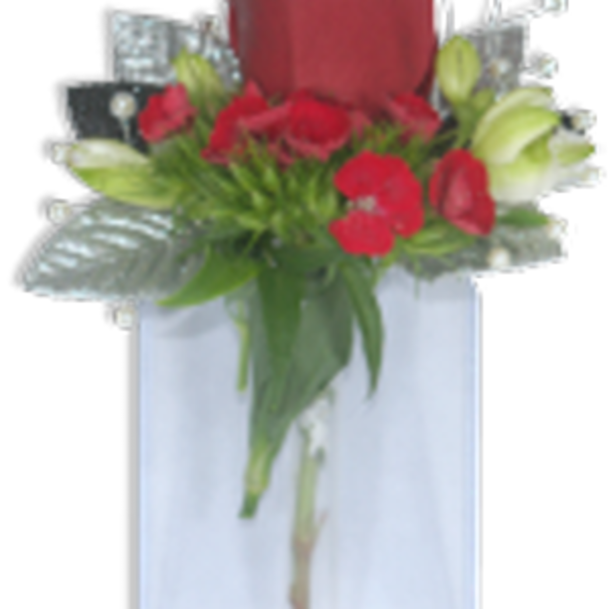 Single red rose with small red flowers and white buds in a tall glass vase with silver accents