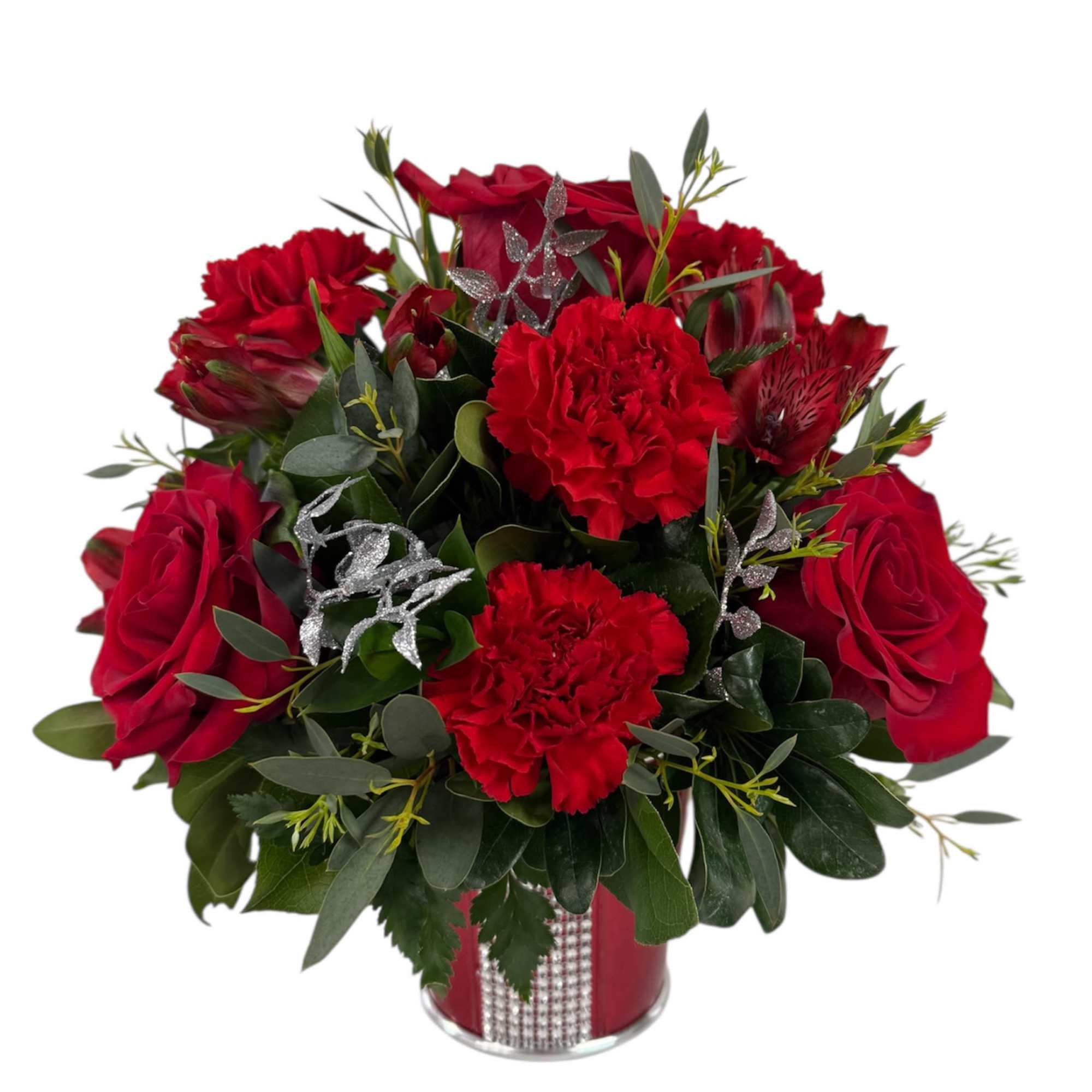 Red roses and carnations arranged in a red vase
