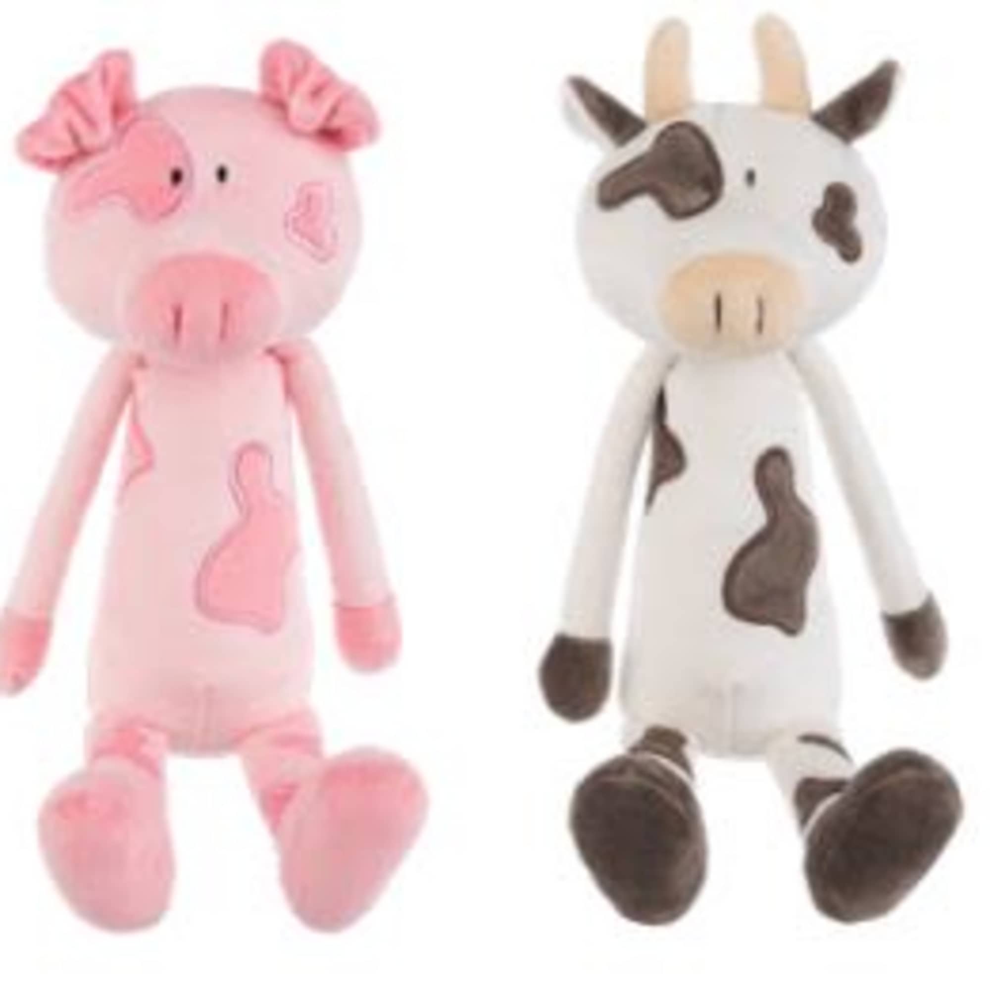 Two plush animal toys, one pink and one cow-patterned, on a white background