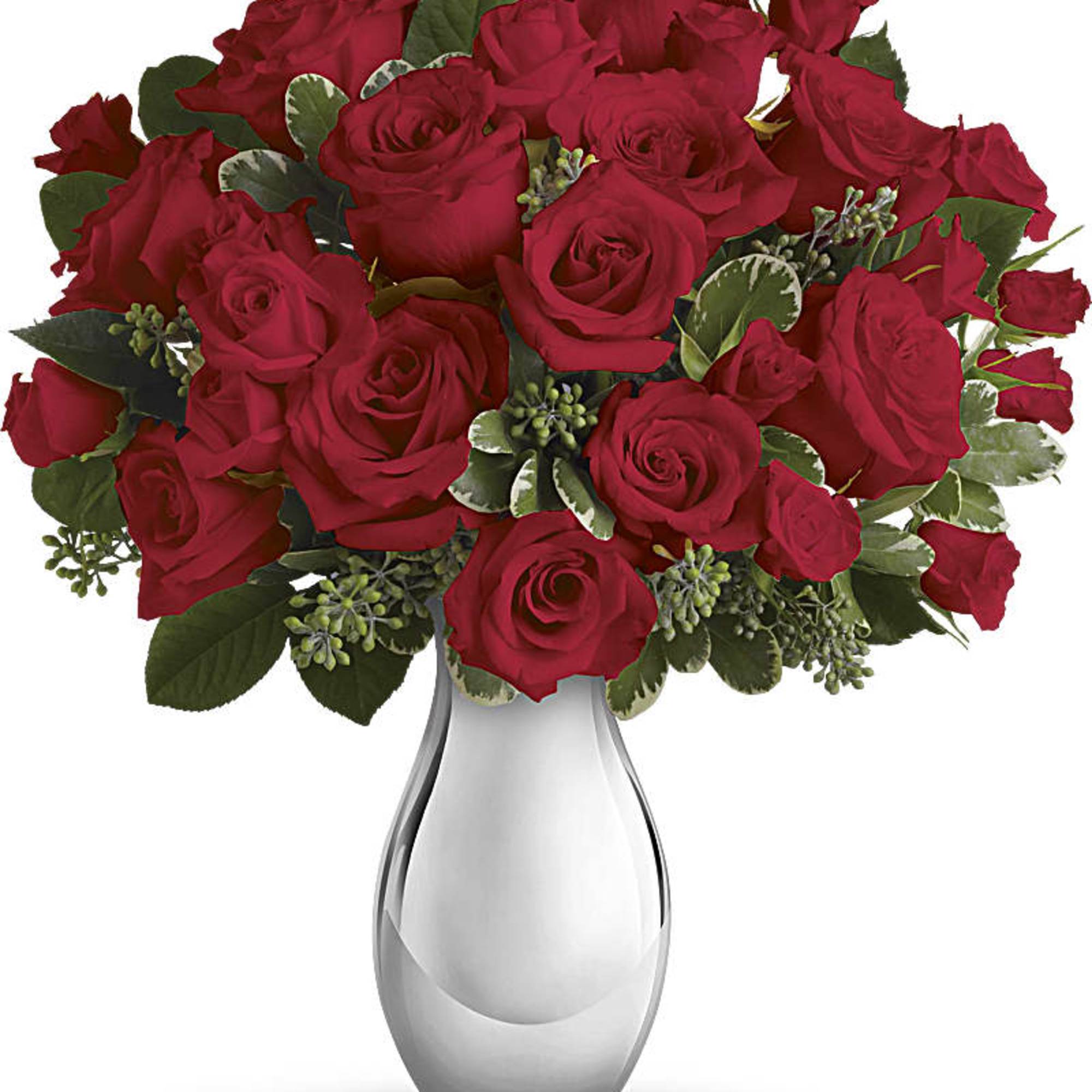 Arrangement of red roses in a shiny silver vase