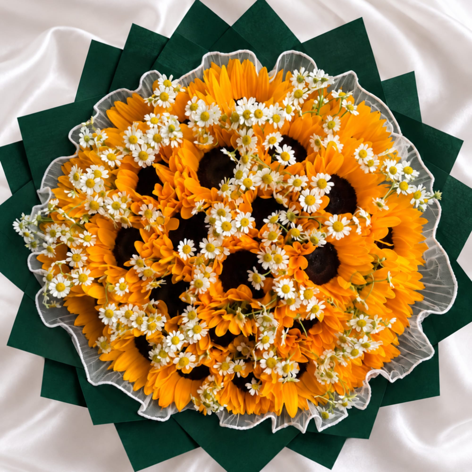 Round bouquet of orange sunflowers and small white daisies