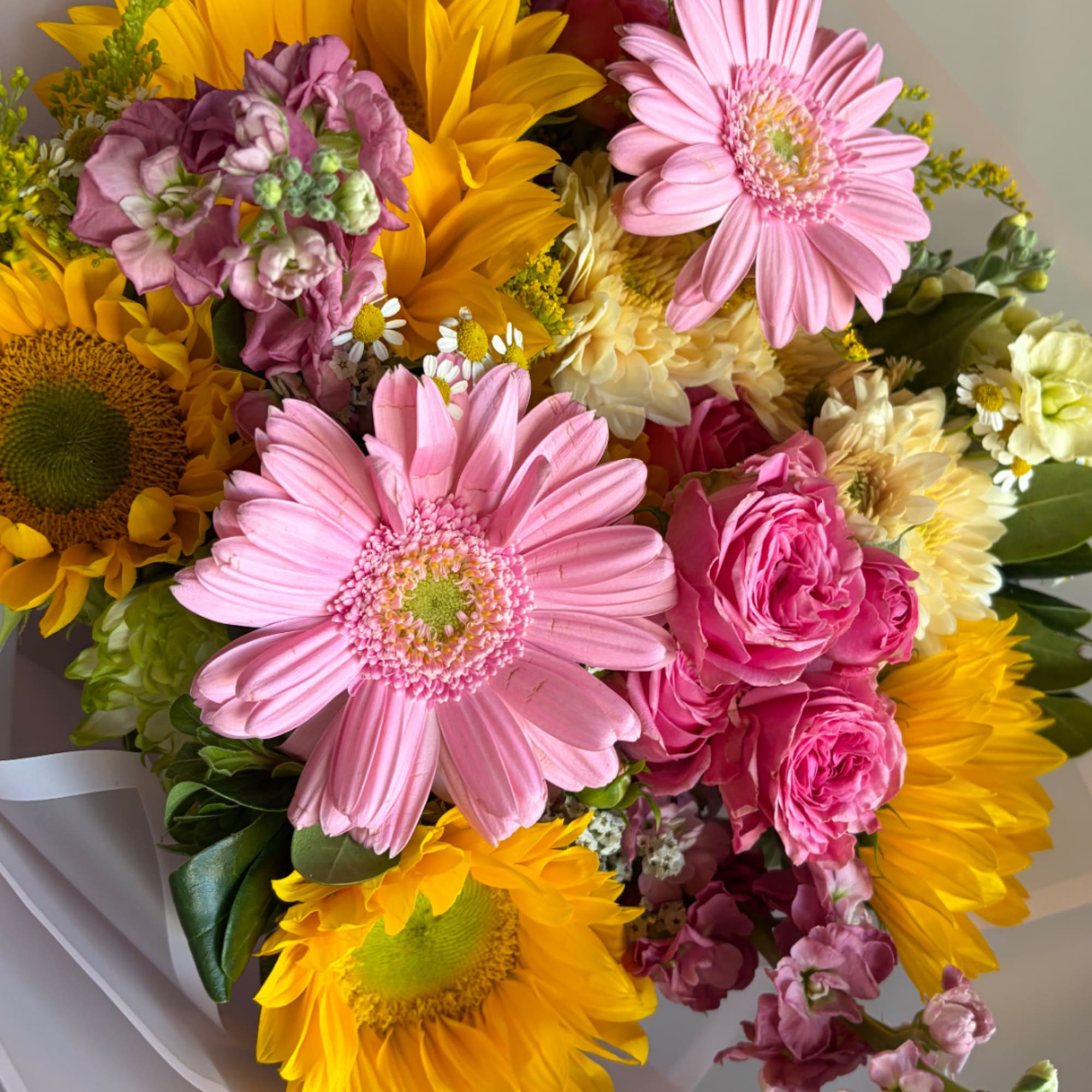Mixed bouquet with pink gerbera daisies, yellow sunflowers, and pink roses, photo 5 of 5