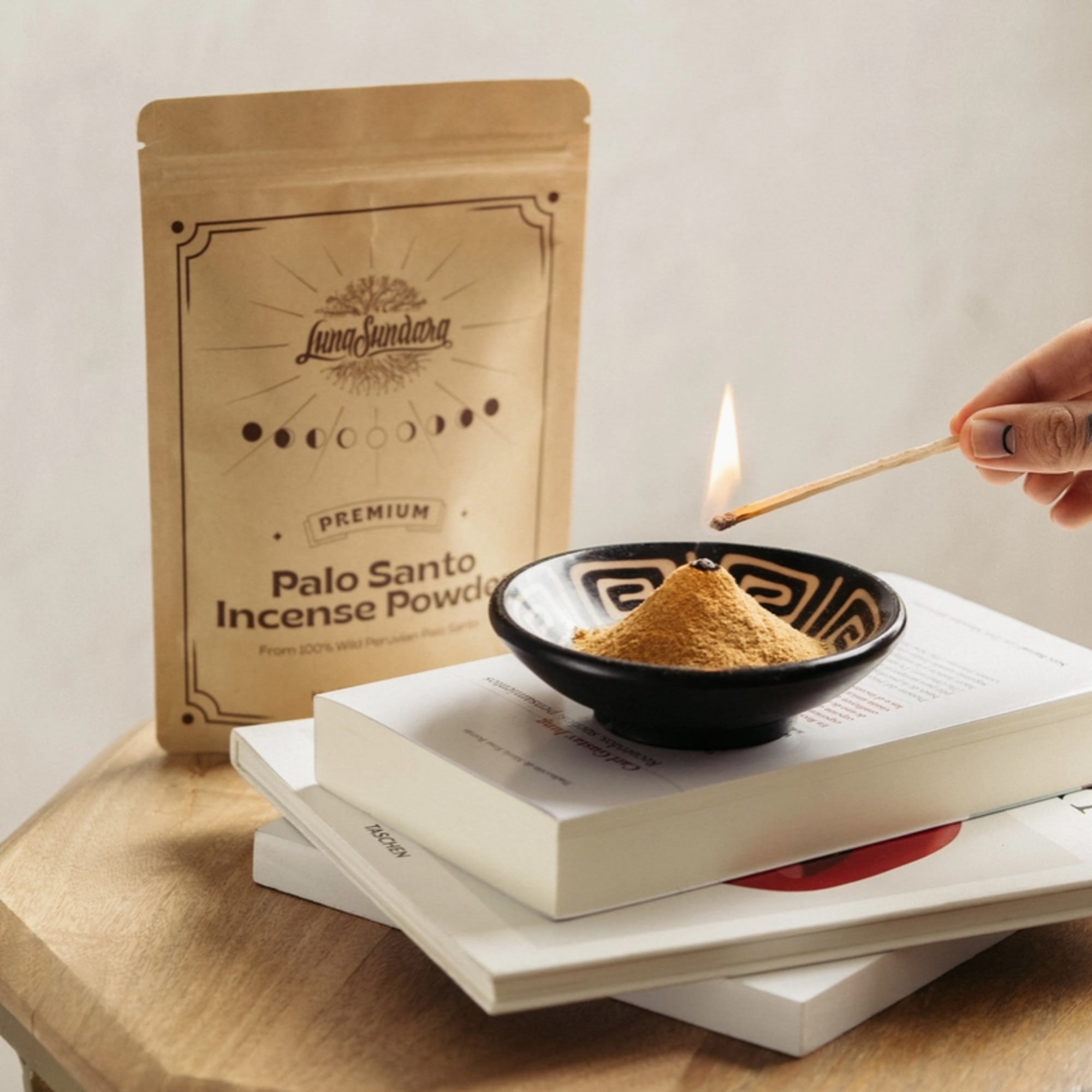 Palo santo incense powder in a bowl with a lit incense stick