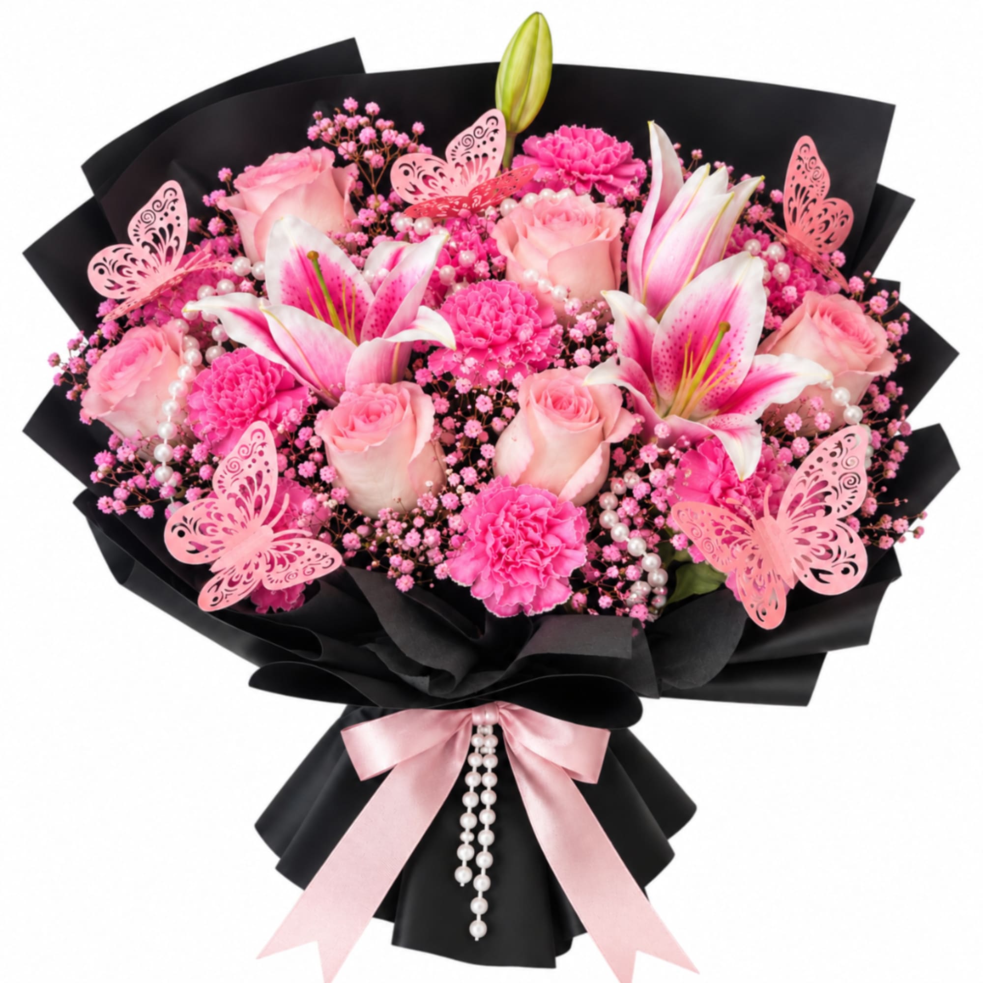 Pink roses and lilies in black wrap with a pink ribbon