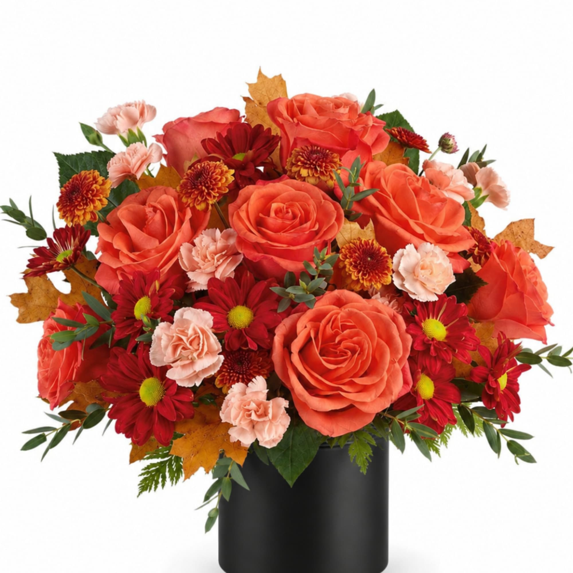 Orange roses and red mums in a black vase