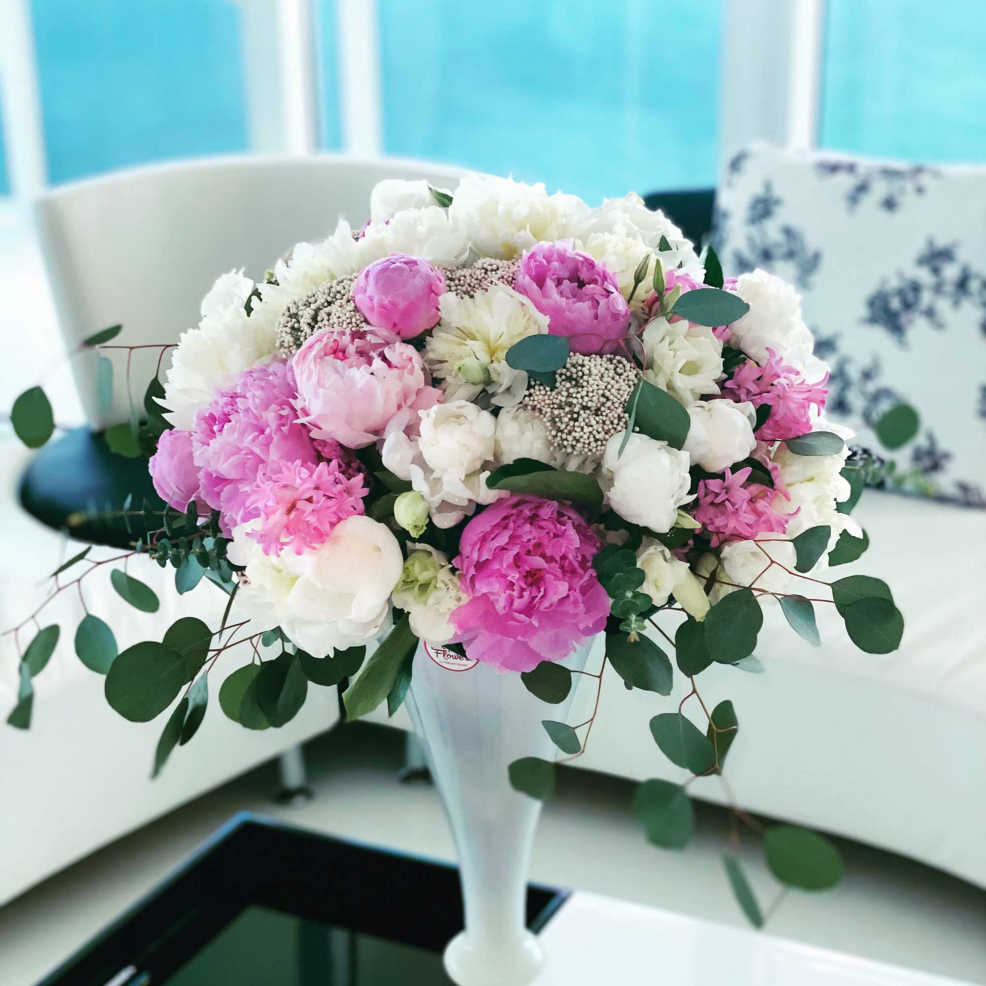 Peonies with lisianthus in a vase . Peony is a symbol of, photo 2 of 2