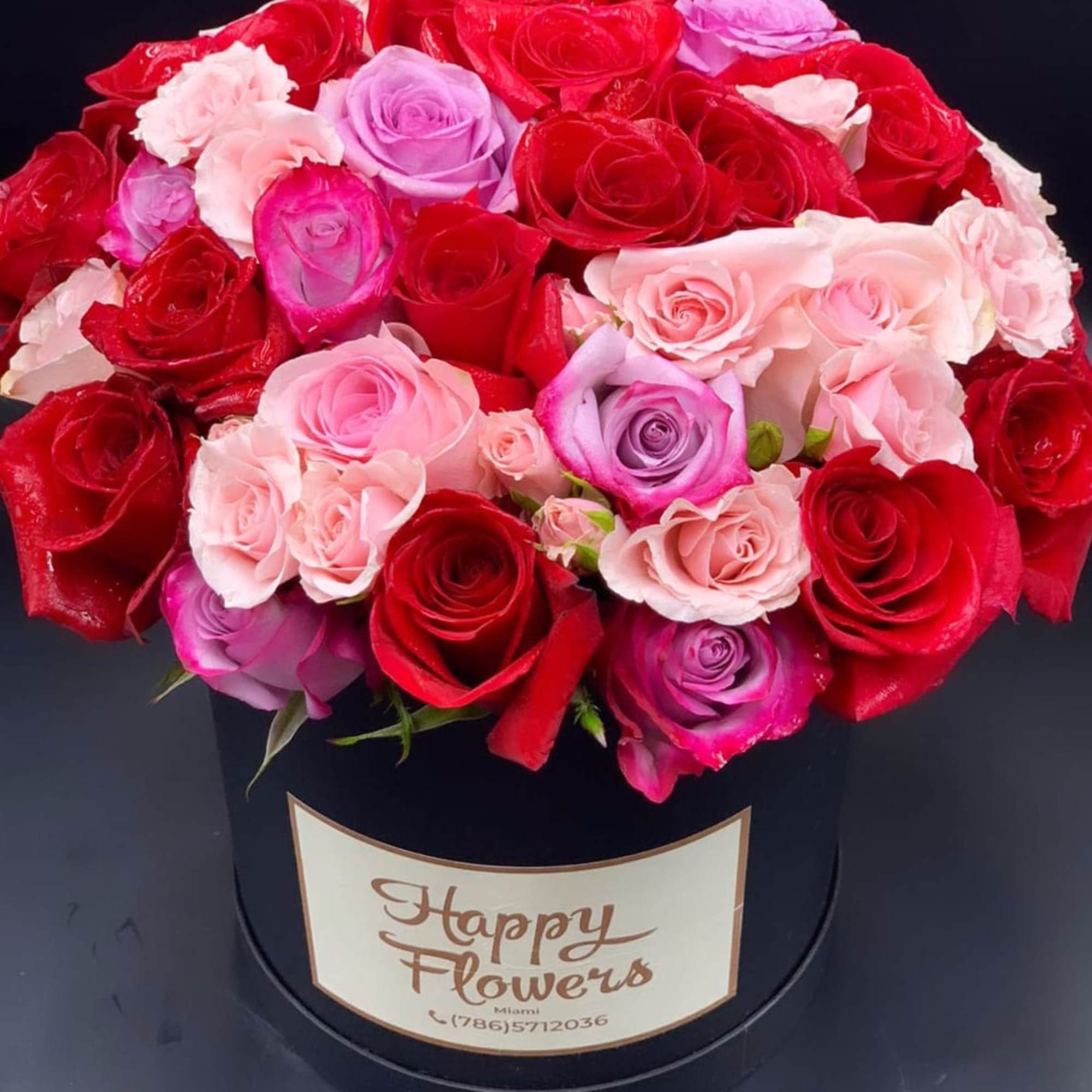 Mix of roses ( red, pink, purple) on a hat box, photo 2 of 2
