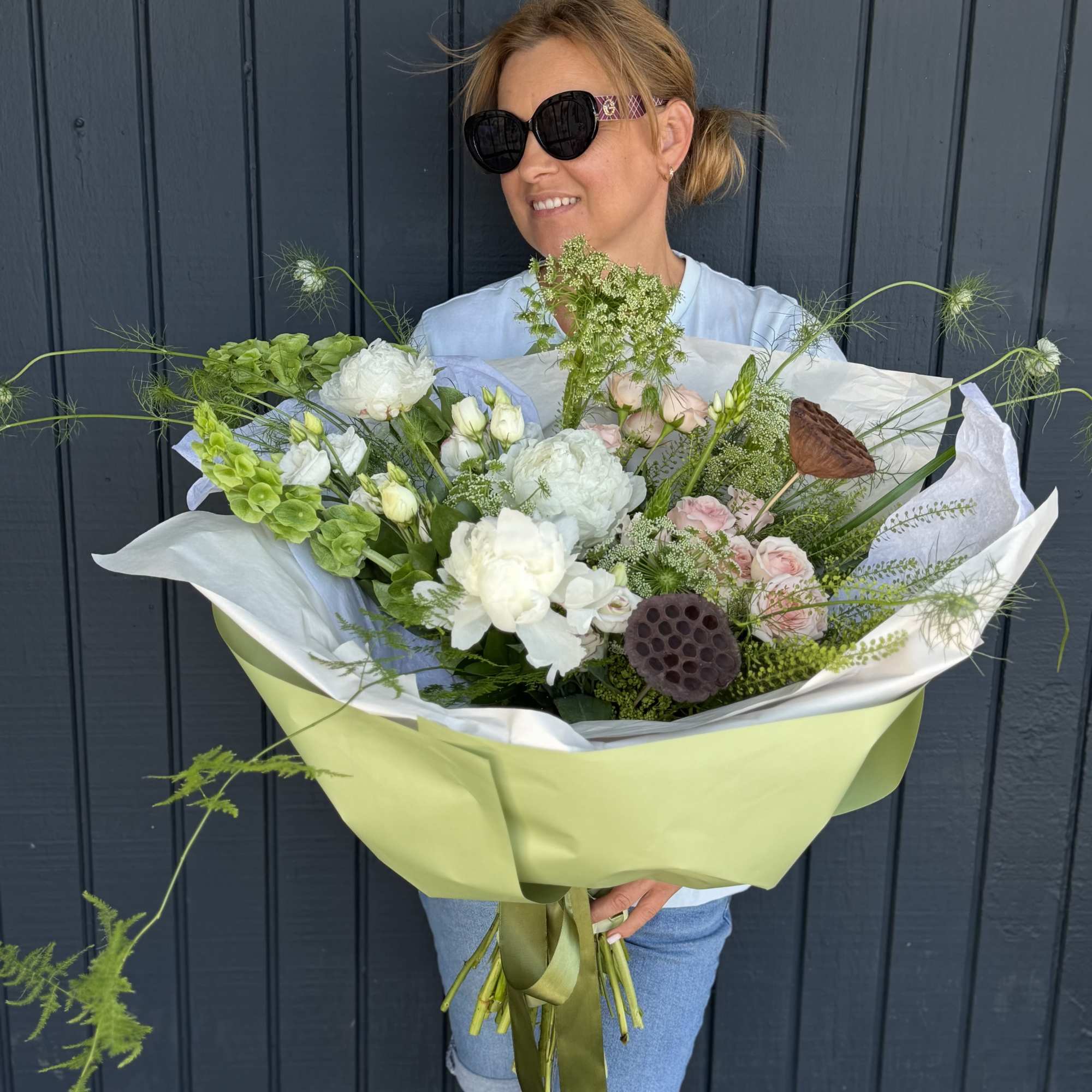 A soft, garden-fresh statement designed to make someone feel truly celebrated: this