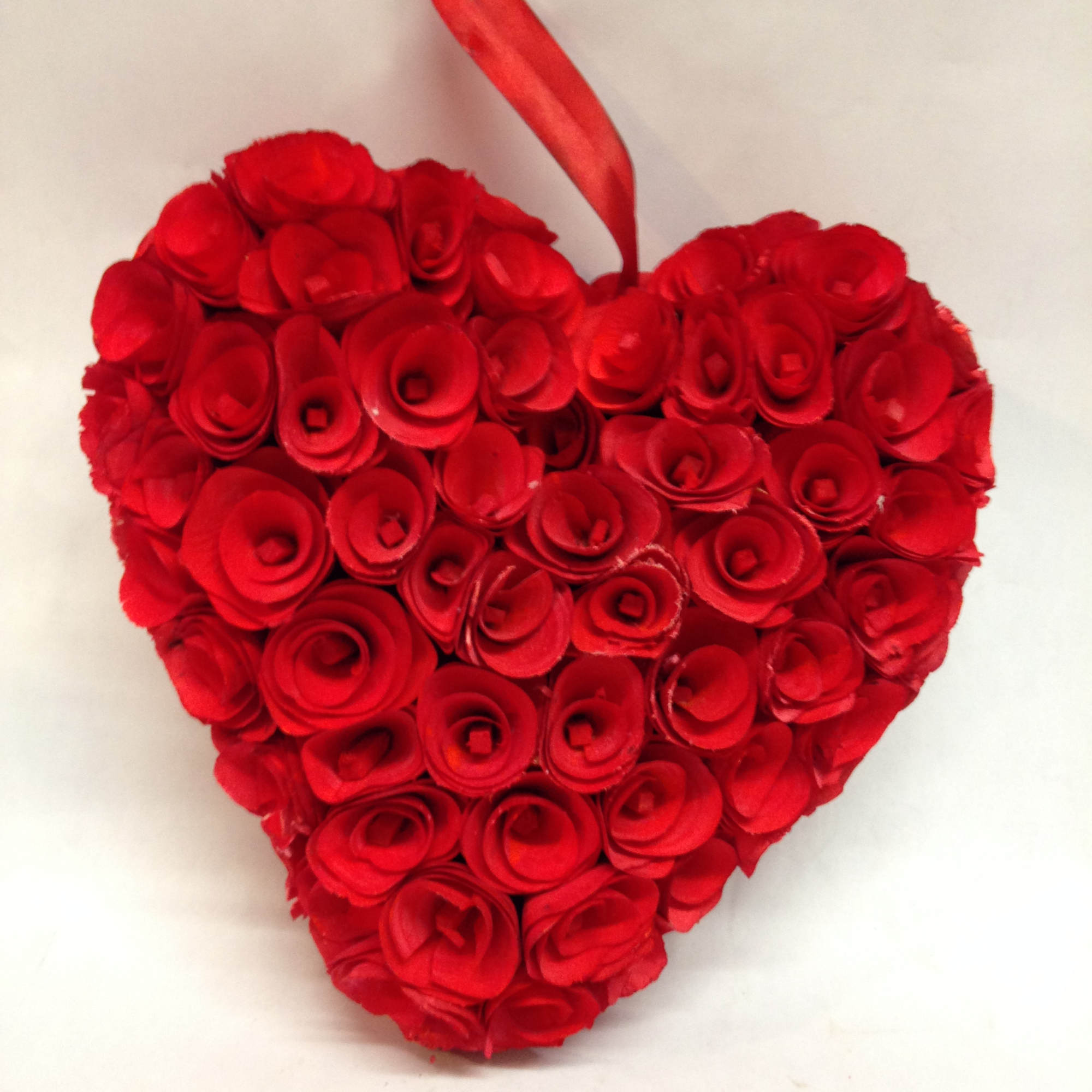 This red decorative heart is made from pencil shavings and lasts a
