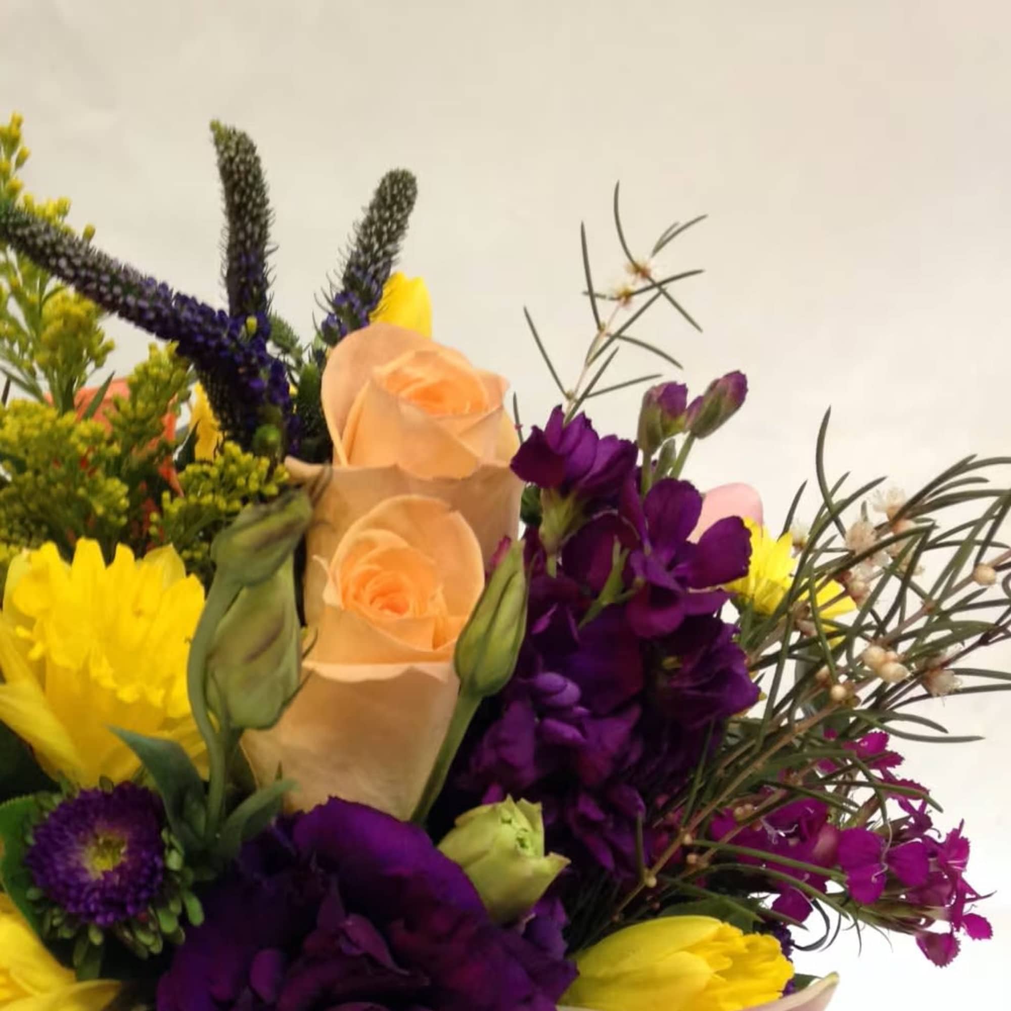 Mixed bouquet with peach roses, purple blooms, and yellow flowers, photo 2 of 4