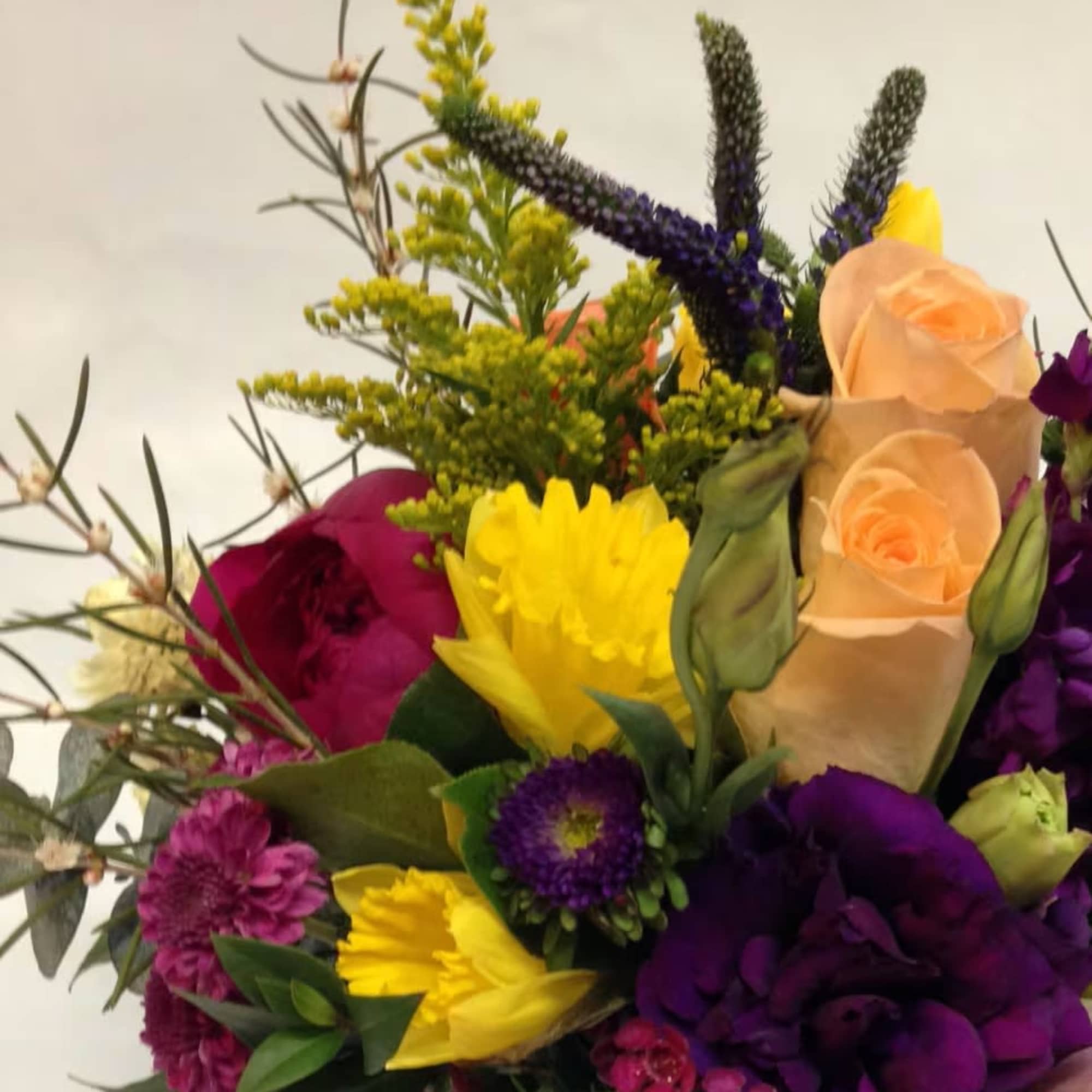 Mixed bouquet with peach roses, purple blooms, and yellow flowers, photo 4 of 4