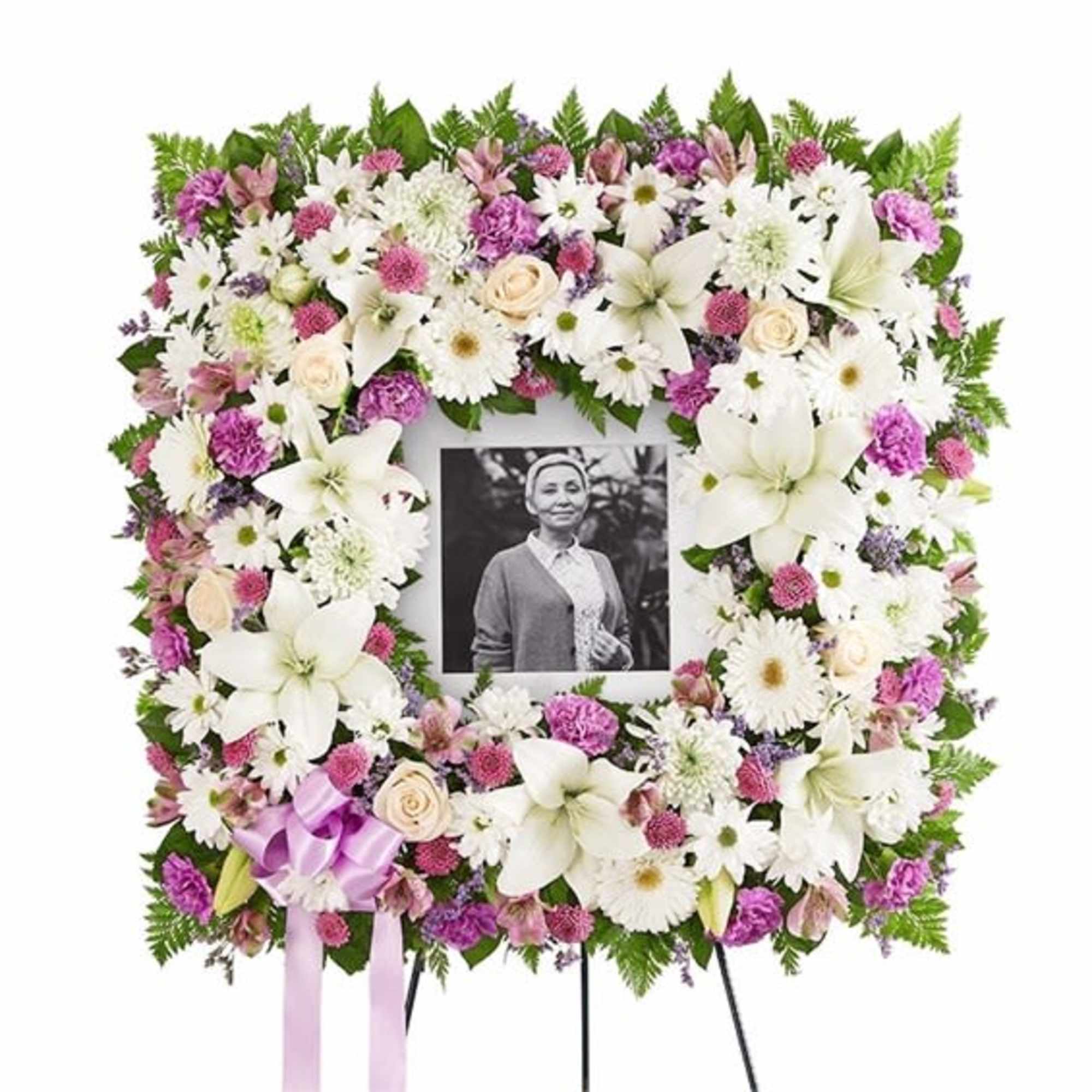 Square floral funeral wreath with a photo in the center