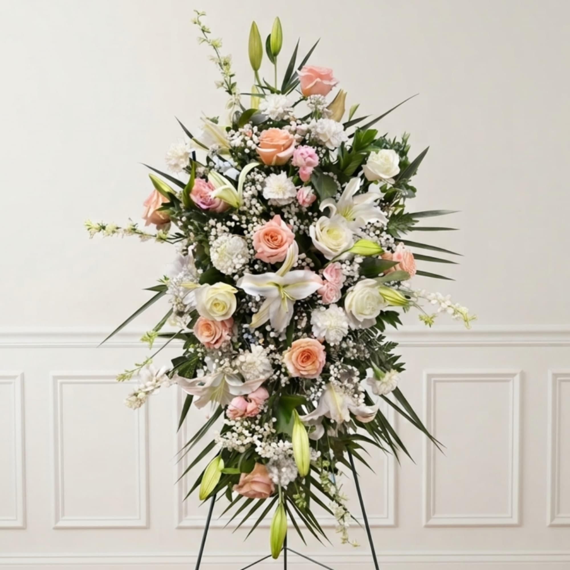 Standing floral spray with pink and white roses and lilies