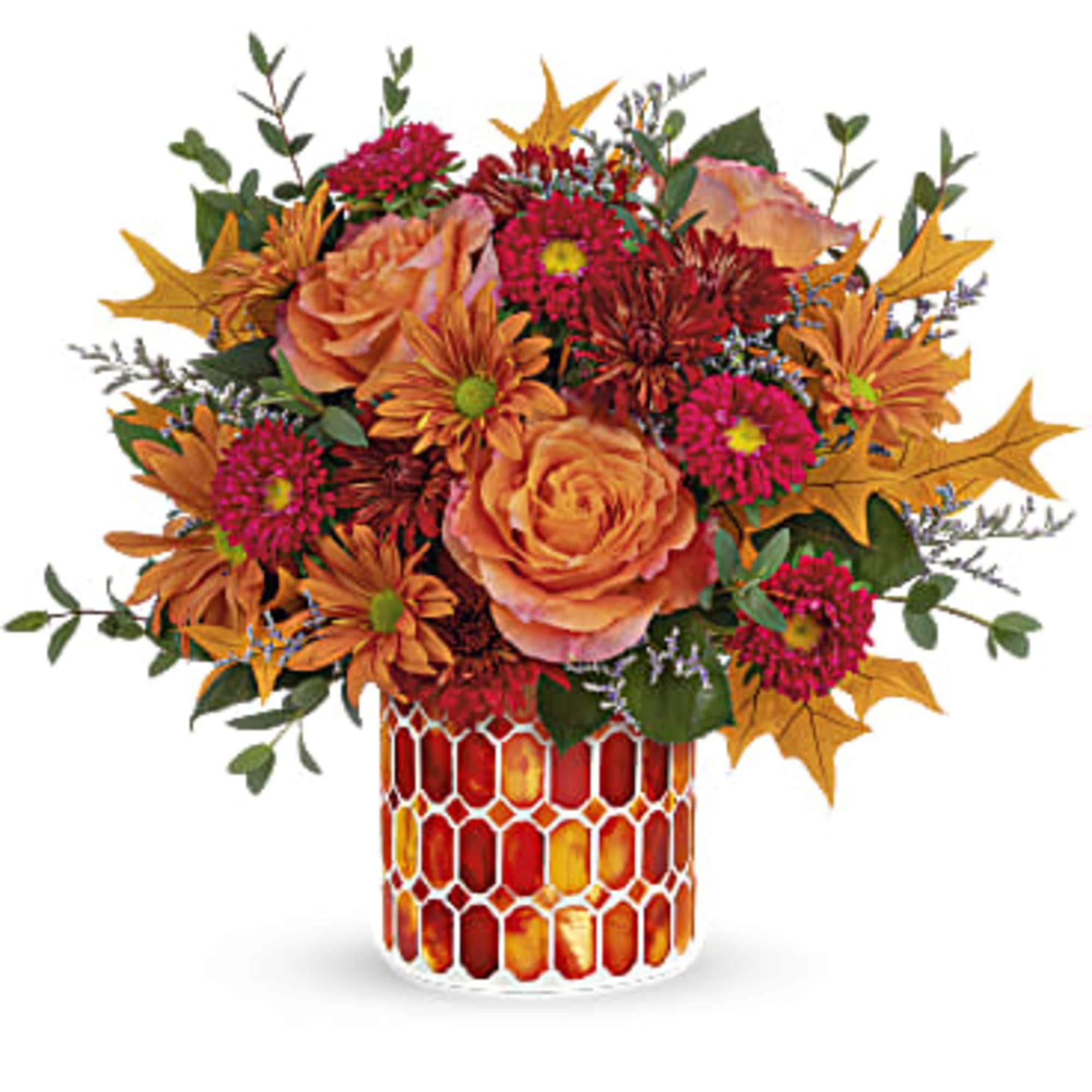 Artfully arranged in a beautiful keepsake vase of stained mosaic glass, this