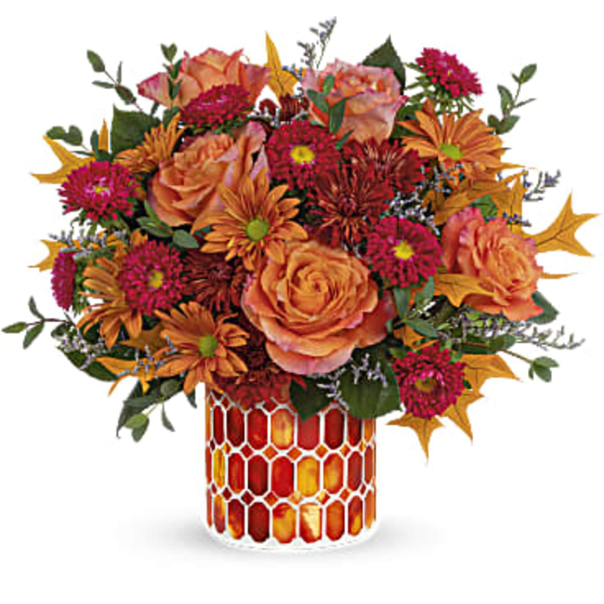 Artfully arranged in a beautiful keepsake vase of stained mosaic glass, this