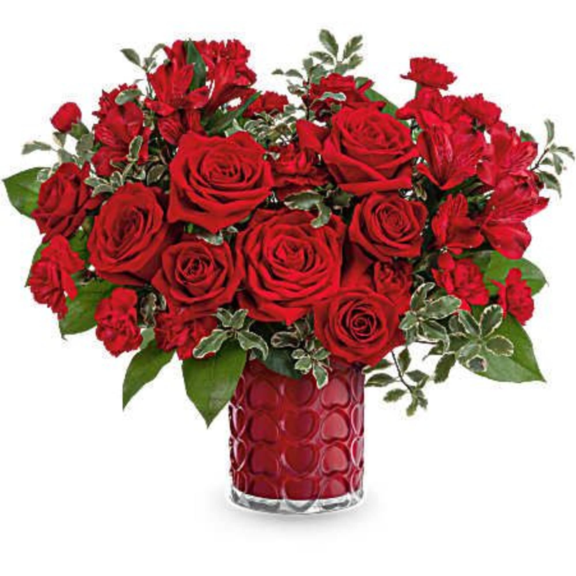 Red roses and carnations in a red glass vase