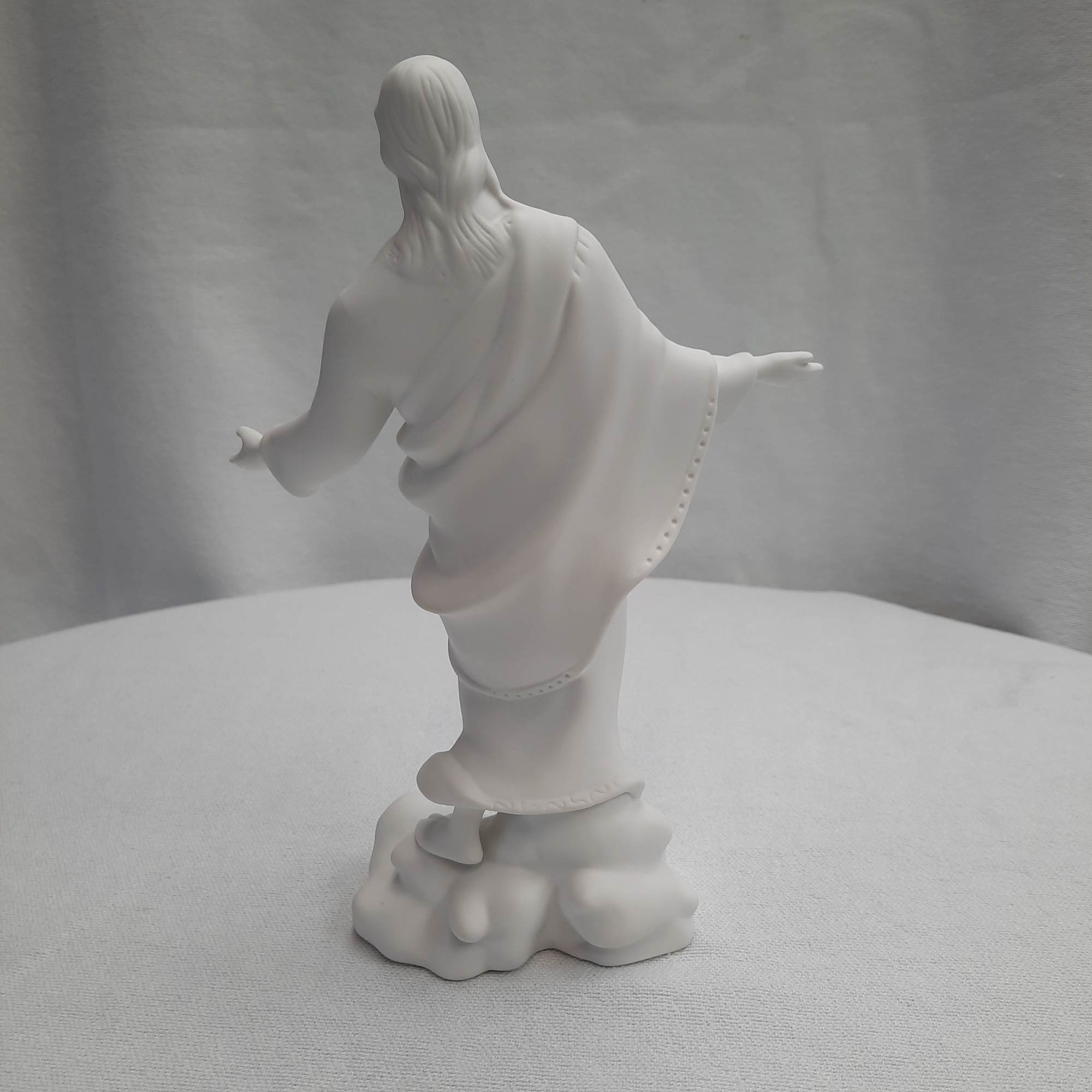 White religious statue of Jesus with outstretched arms, photo 3 of 3