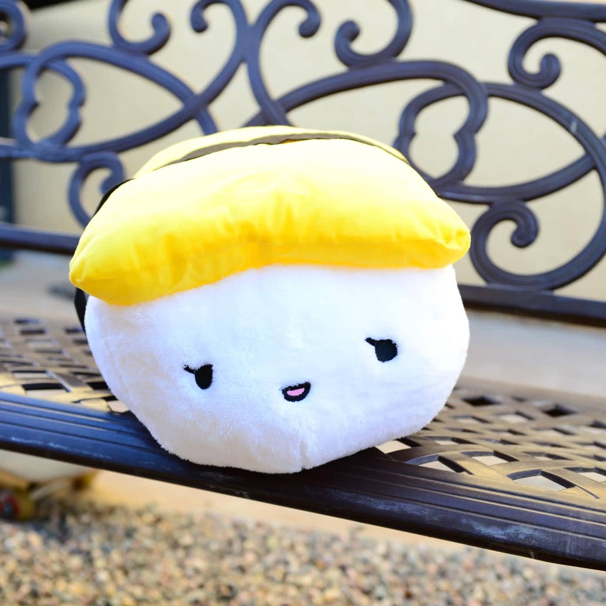 These sushi stuffed animals are fluffy and adorable. They are about 15"